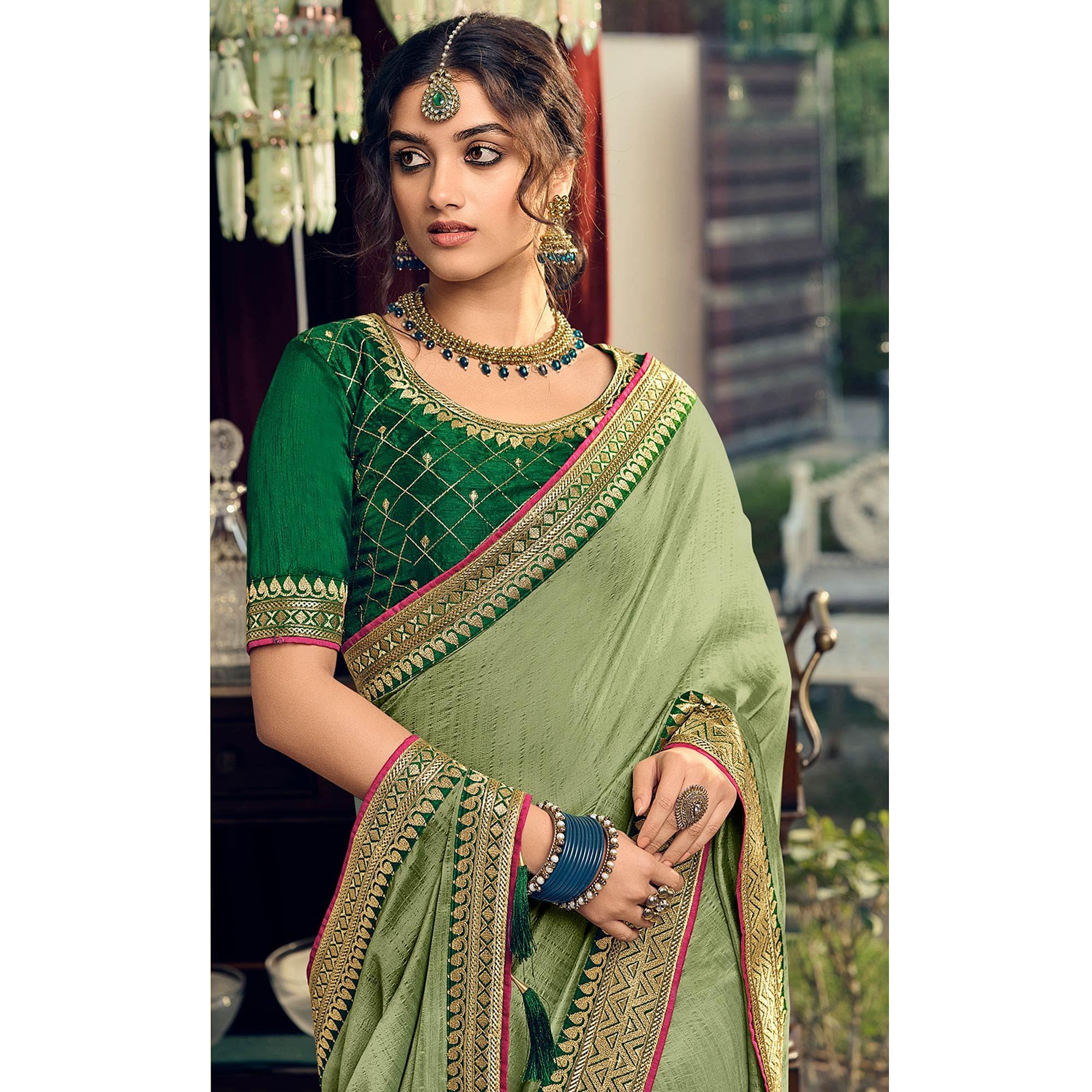 Green Partywear Embroidered Silk Saree - Peachmode