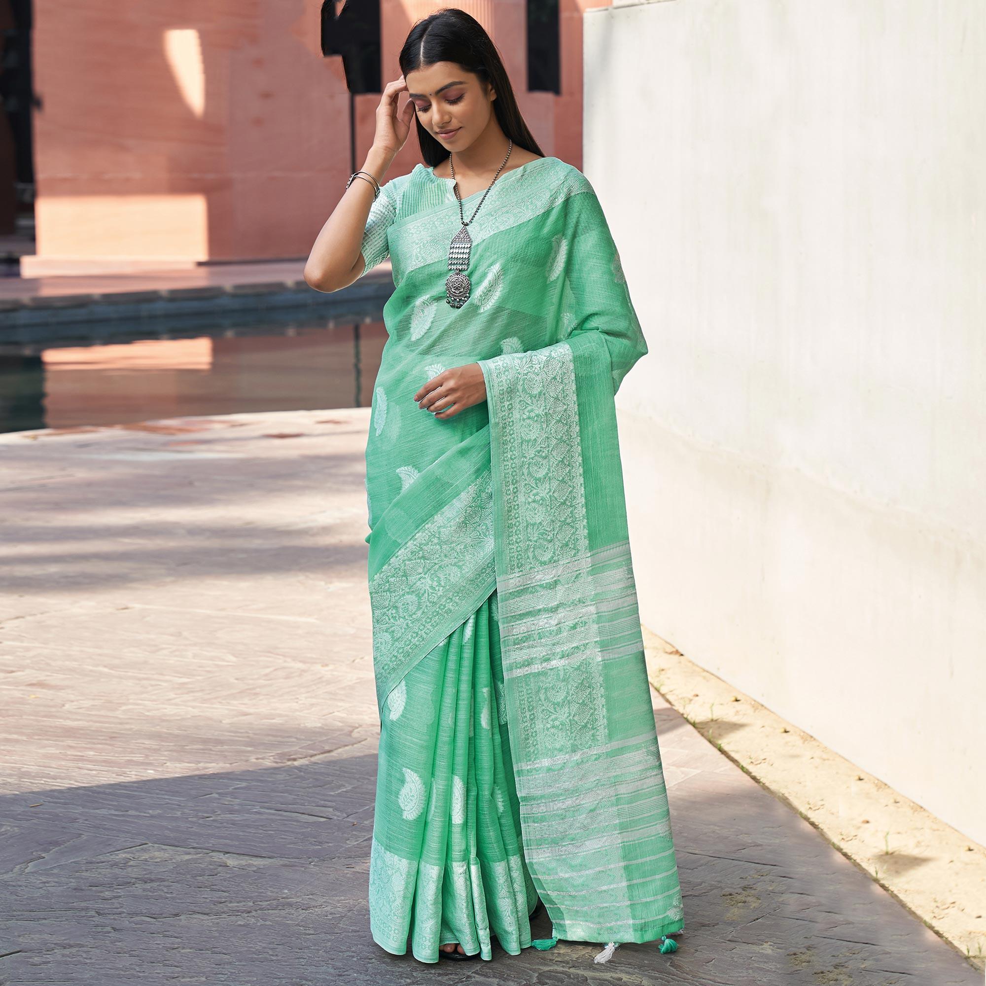 Green Partywear Woven Linen Saree - Peachmode