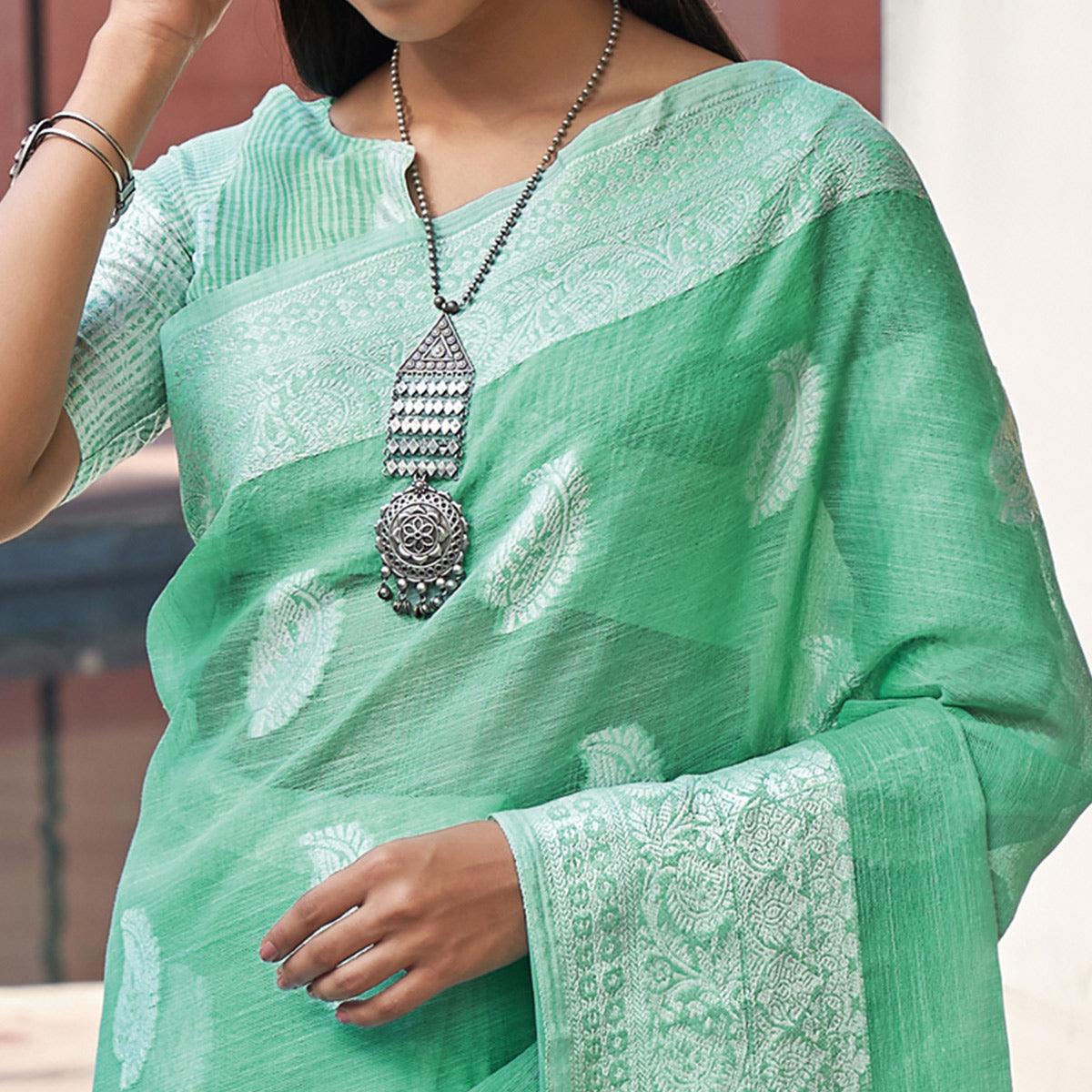 Green Partywear Woven Linen Saree - Peachmode