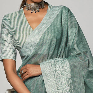 Green Partywear Woven Linen Saree - Peachmode