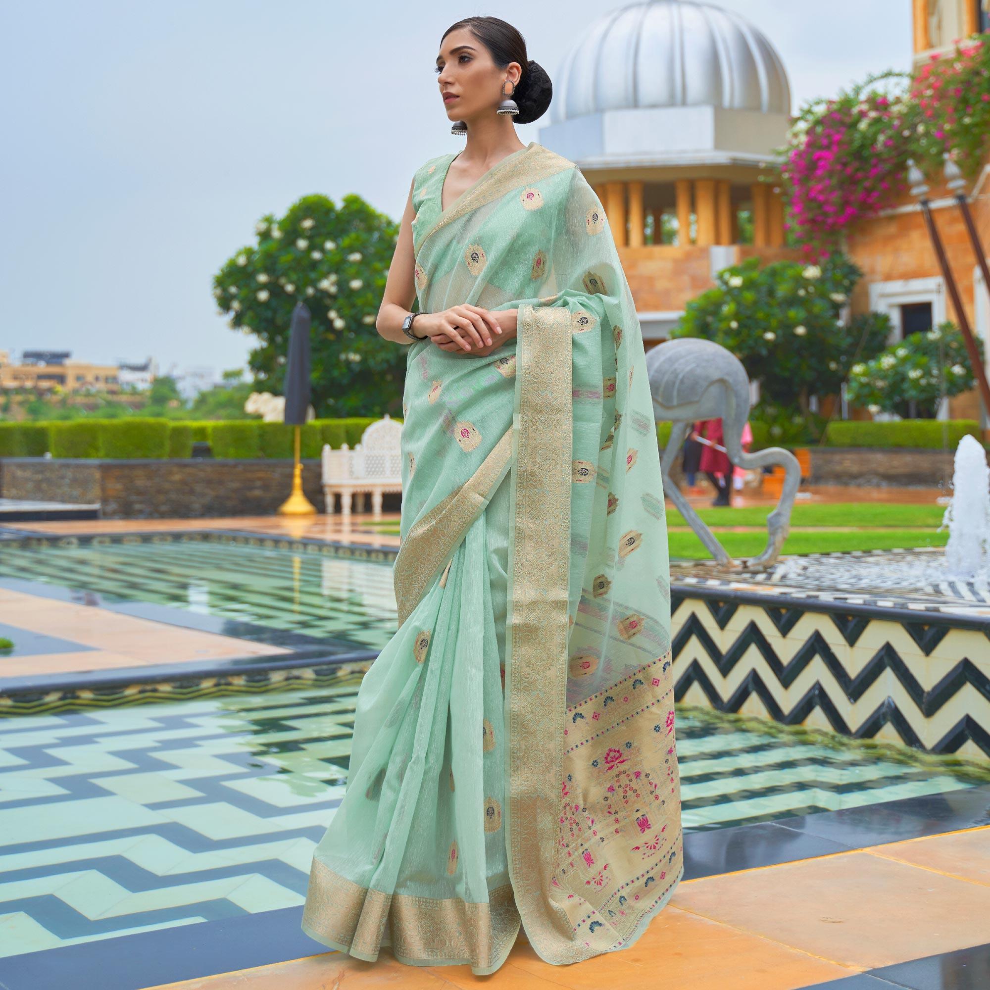 Green Partywear Woven Pure Linen Saree - Peachmode