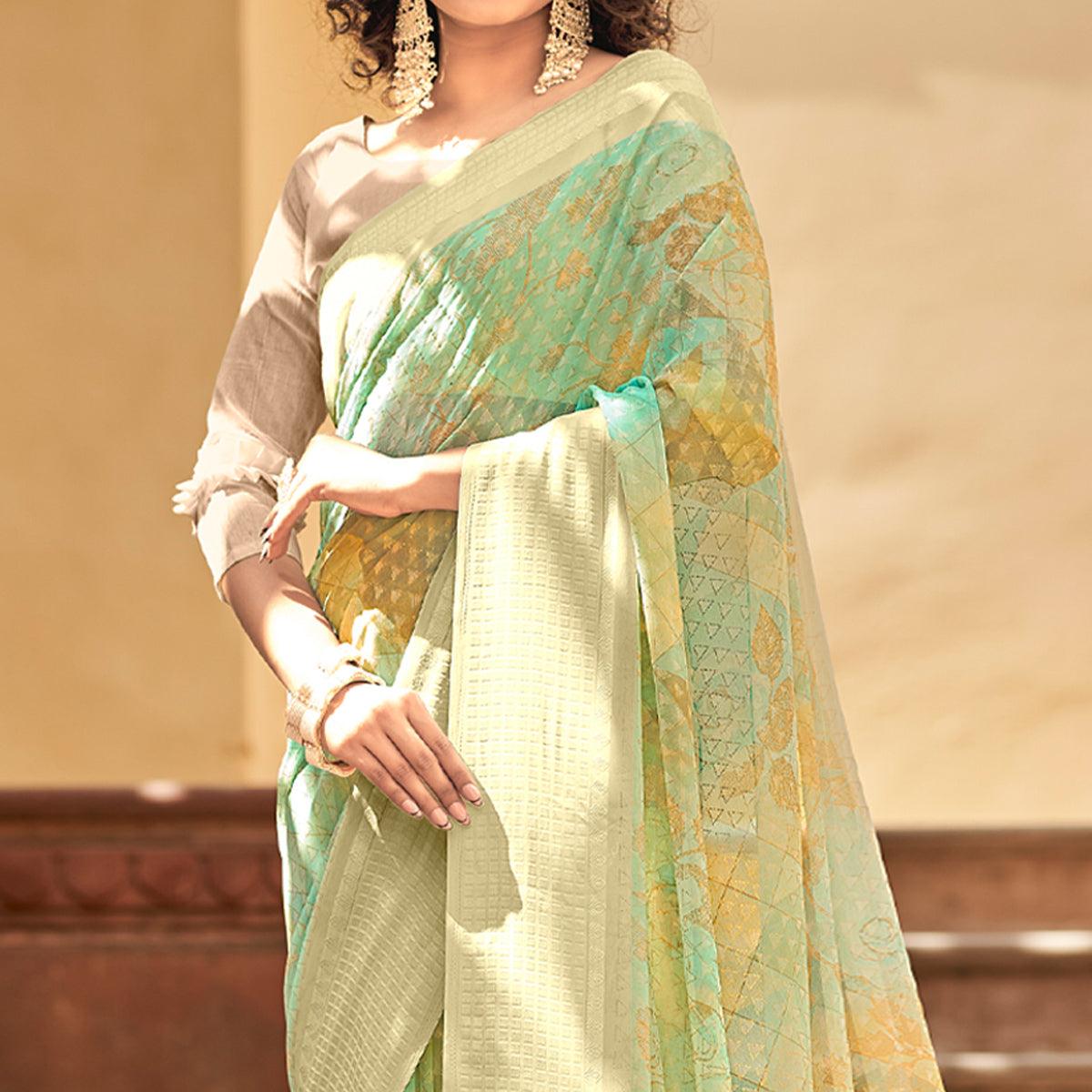 Green Printed Georgette Saree With Tassels - Peachmode