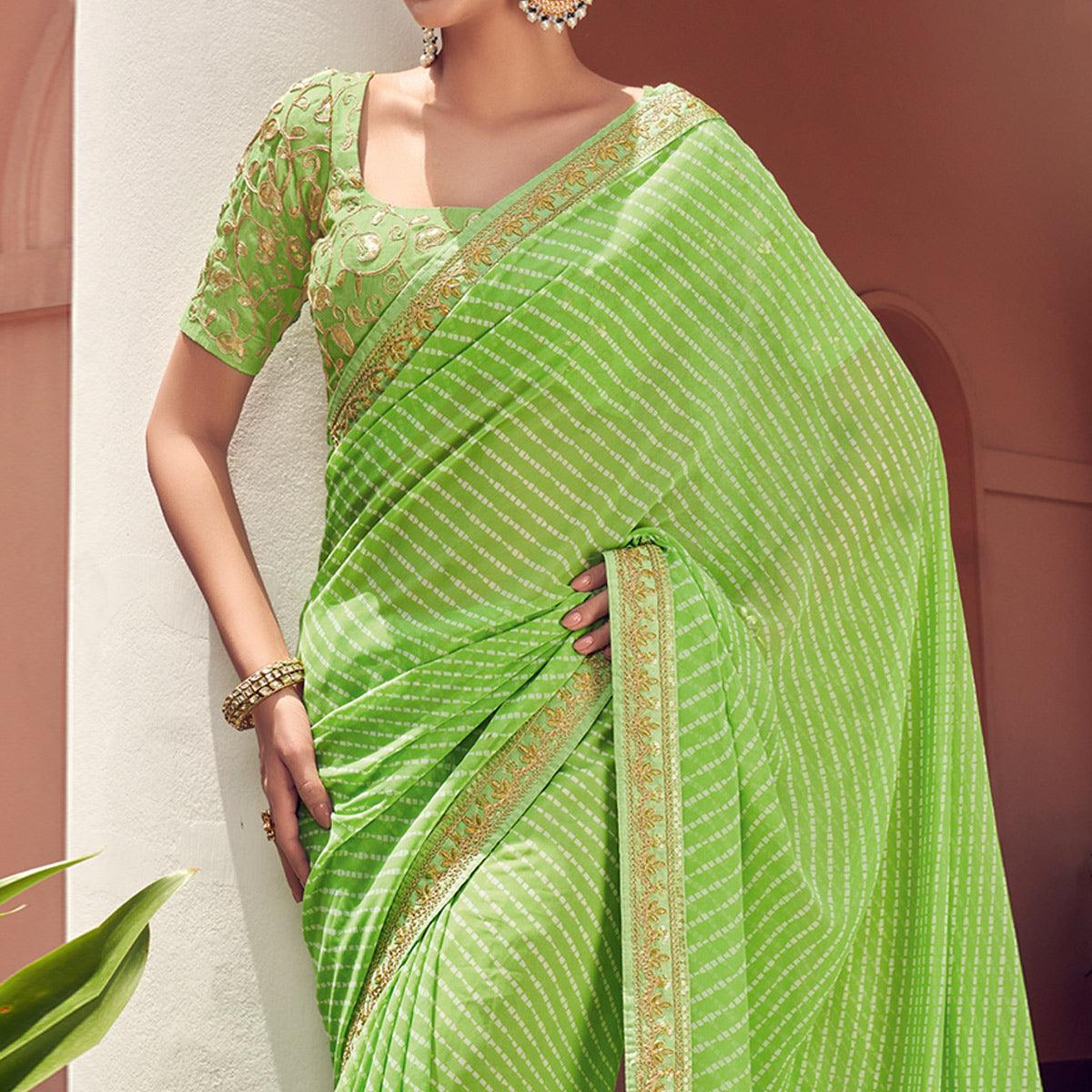 Green Striped Printed Georgette Saree - Peachmode