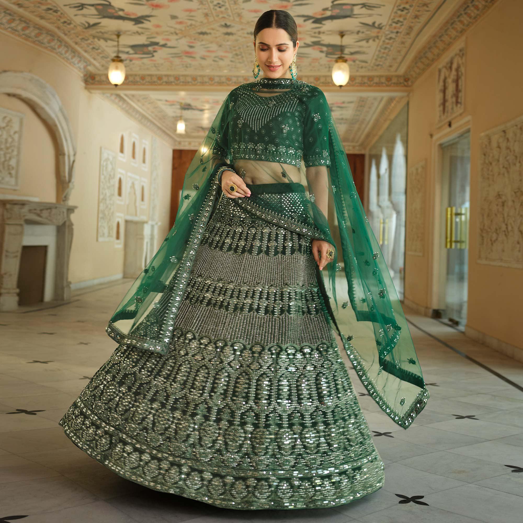 Green Wedding Wear Embellished Netted Lehenga Choli - Peachmode