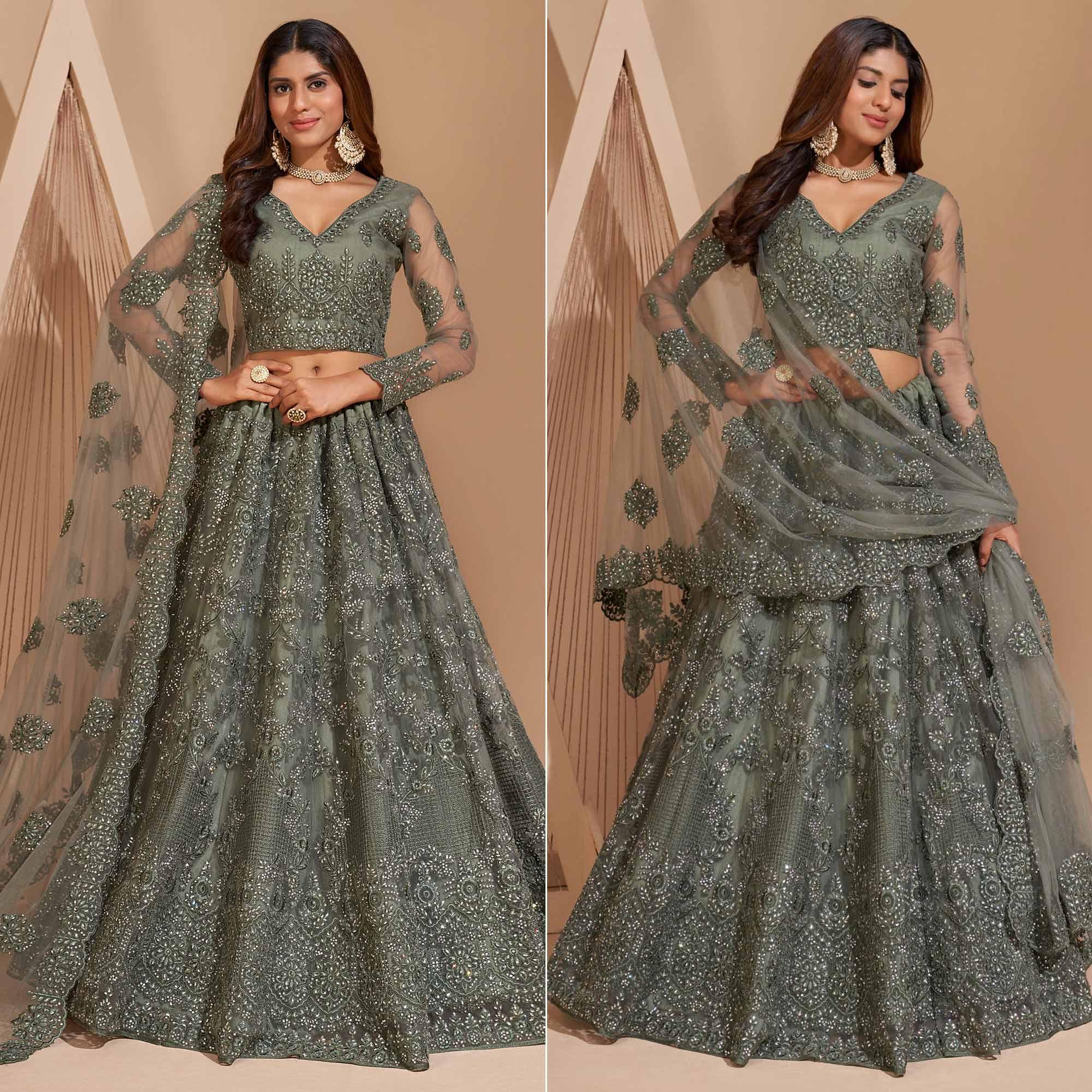 Green Wedding Wear Embroidered With Embellished Net Lehenga Choli - Peachmode