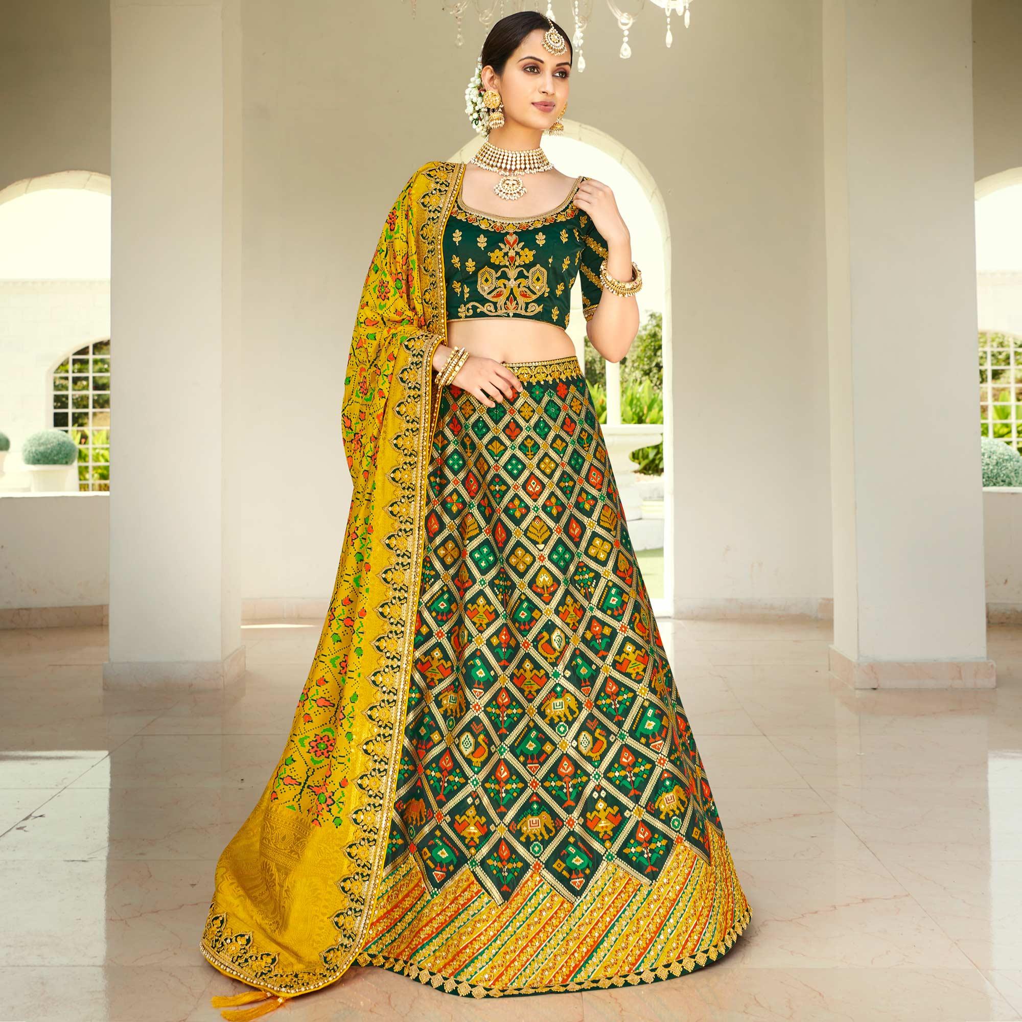 Green Wedding Wear Heavy Embroidered Banarasi Silk Lehenga Choli - Peachmode