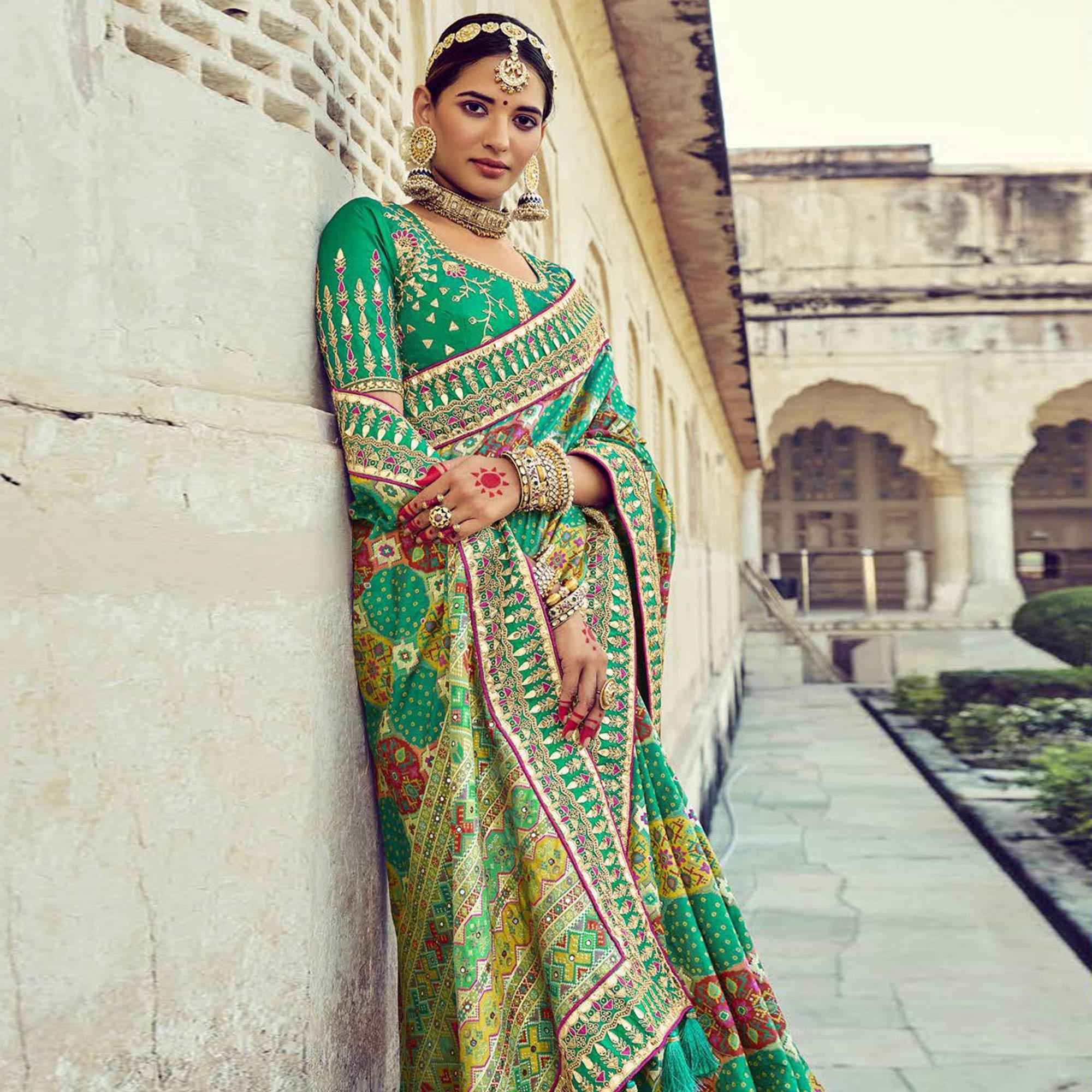 Green Wedding Wear Resham With Embellished Silk Bhandhani Patola Saree - Peachmode