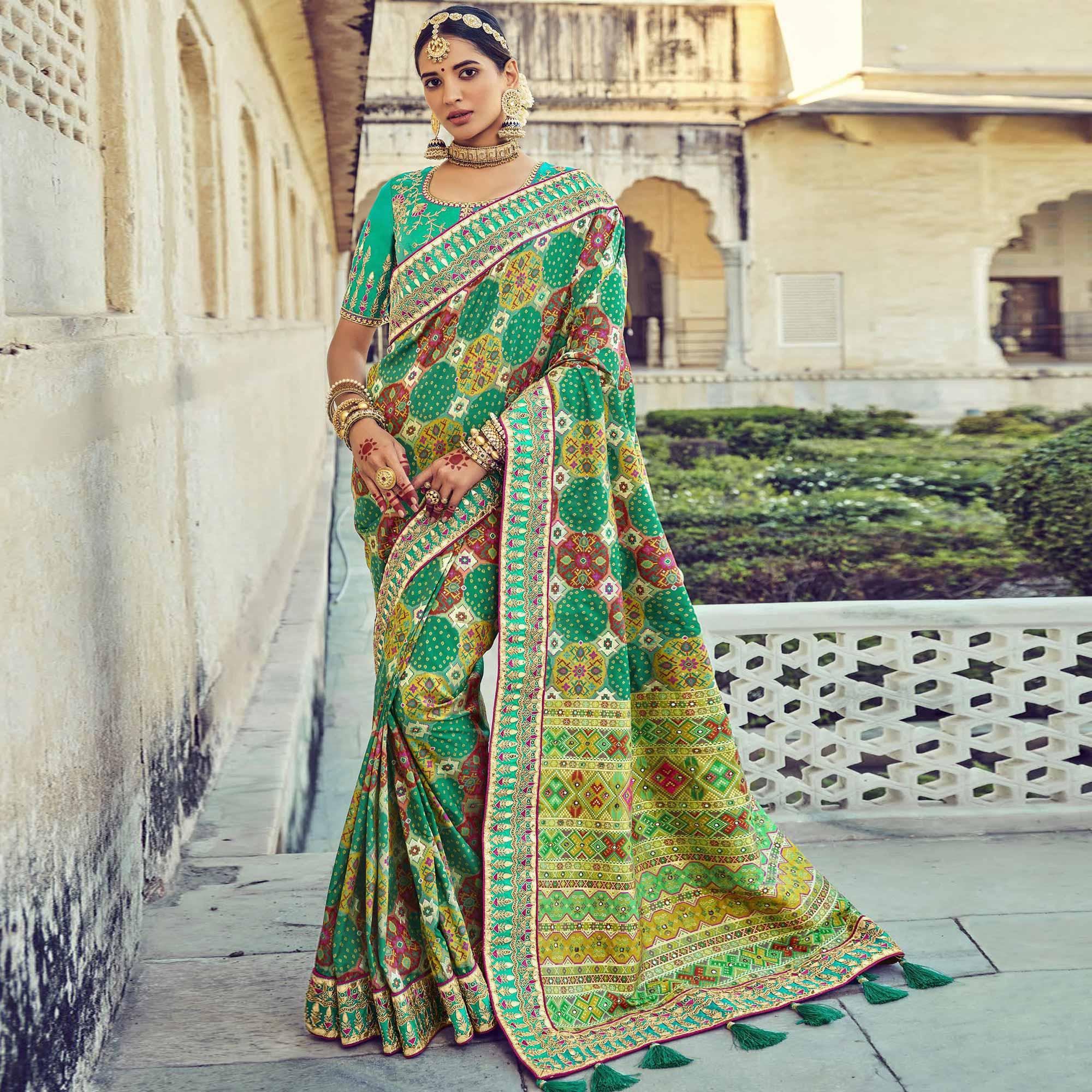 Green Wedding Wear Resham With Embellished Silk Bhandhani Patola Saree - Peachmode
