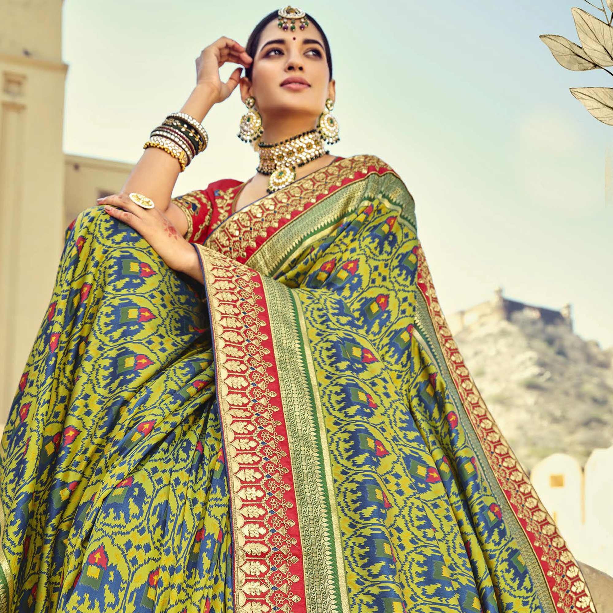 Green Wedding Wear Resham With Embellished Silk Patola Saree - Peachmode
