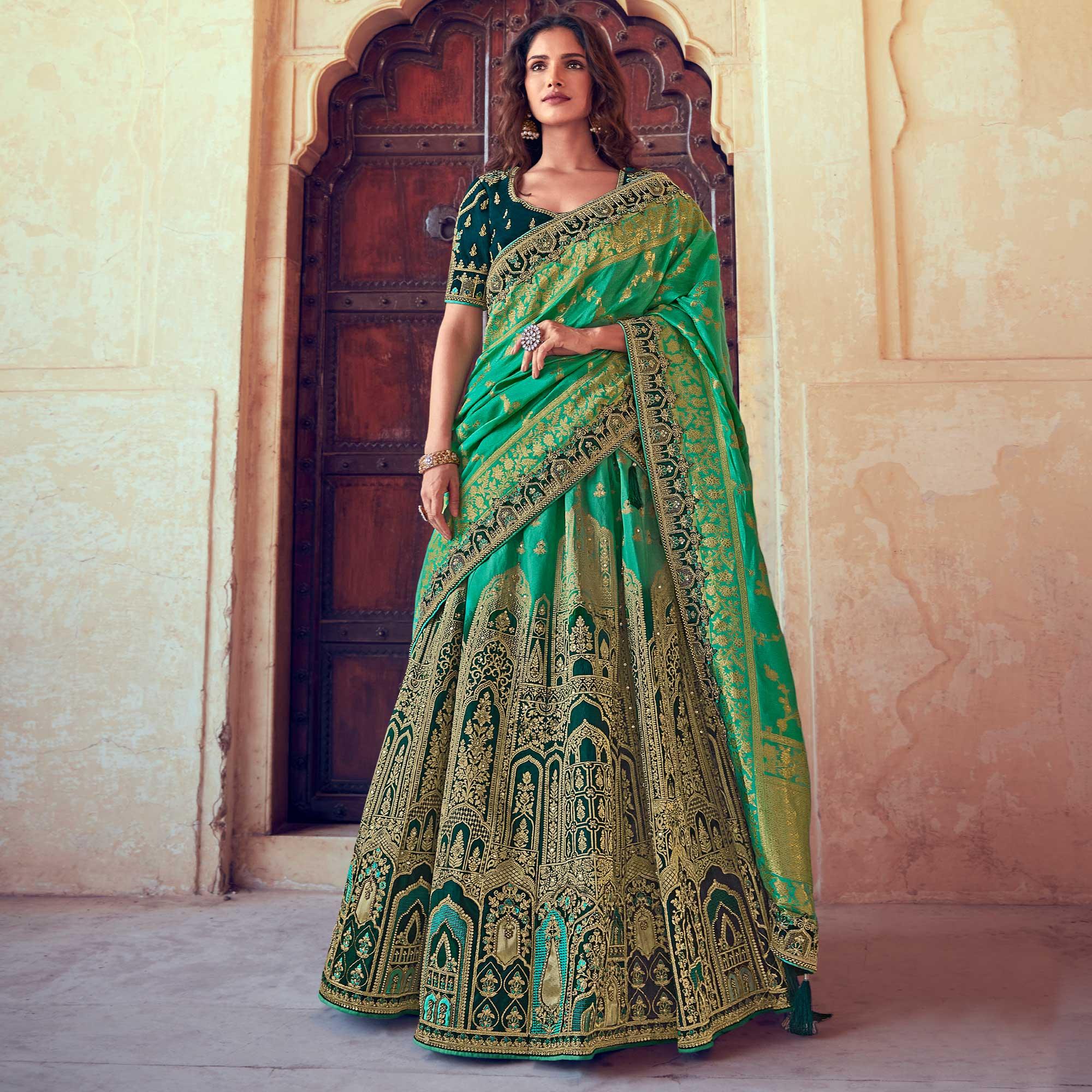 Green Wedding Wear Woven & Embroidered Silk Lehenga Choli - Peachmode