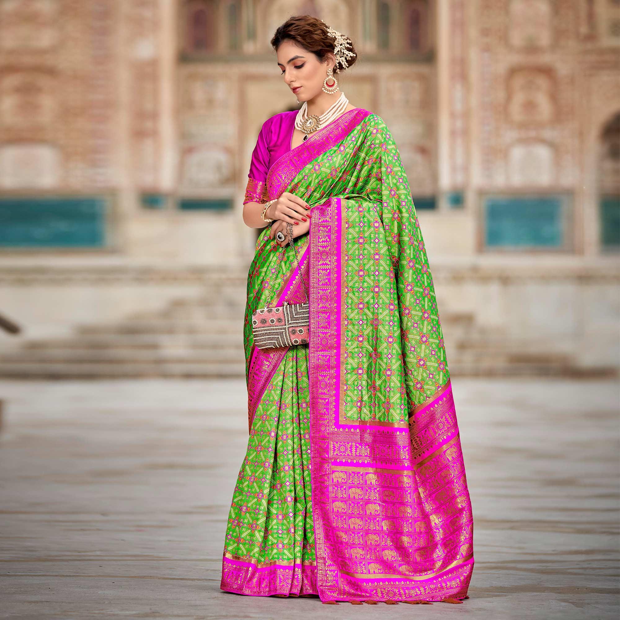 Green Woven Art Silk Saree With Tassels - Peachmode