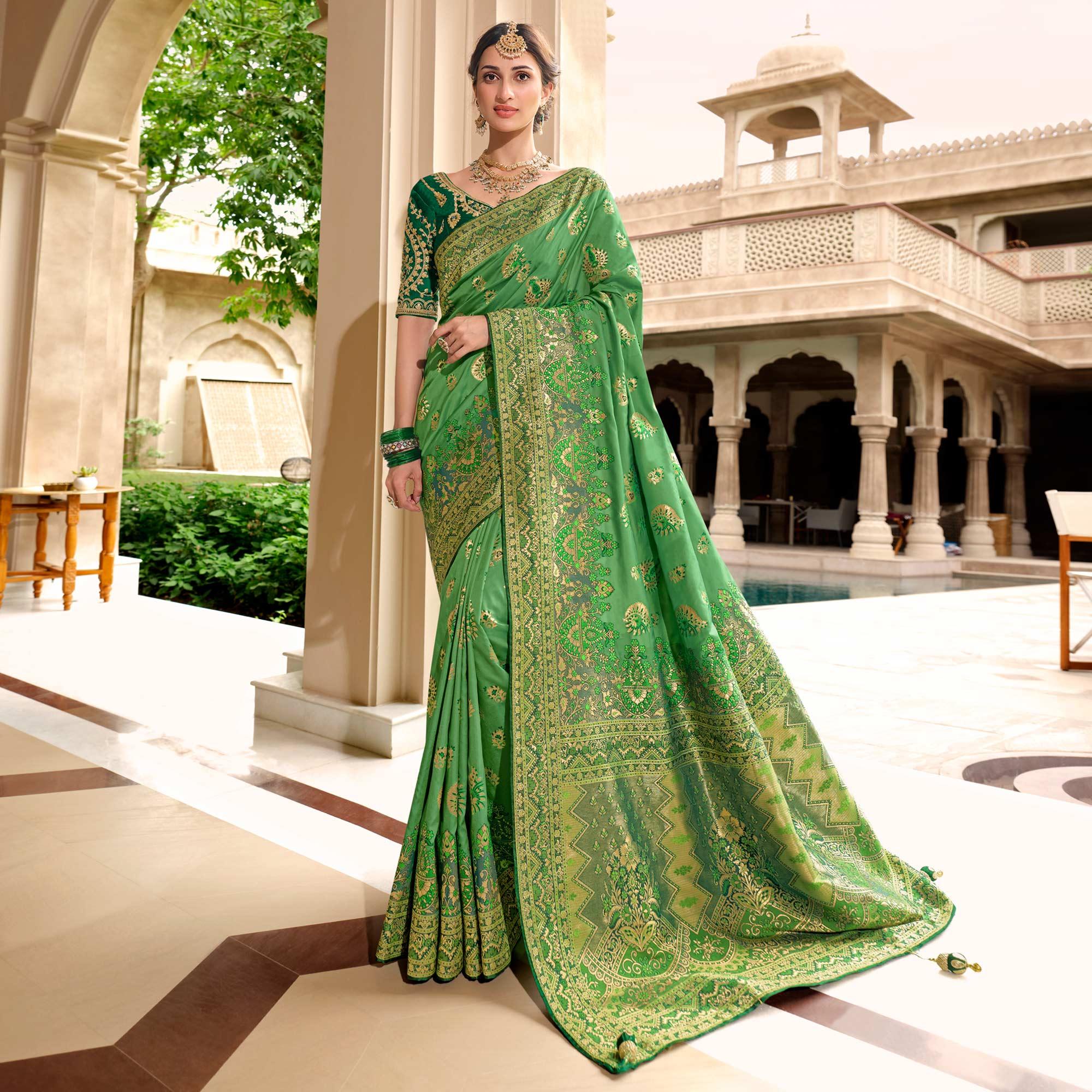 Green Woven Banarasi Silk Saree With Tassels - Peachmode