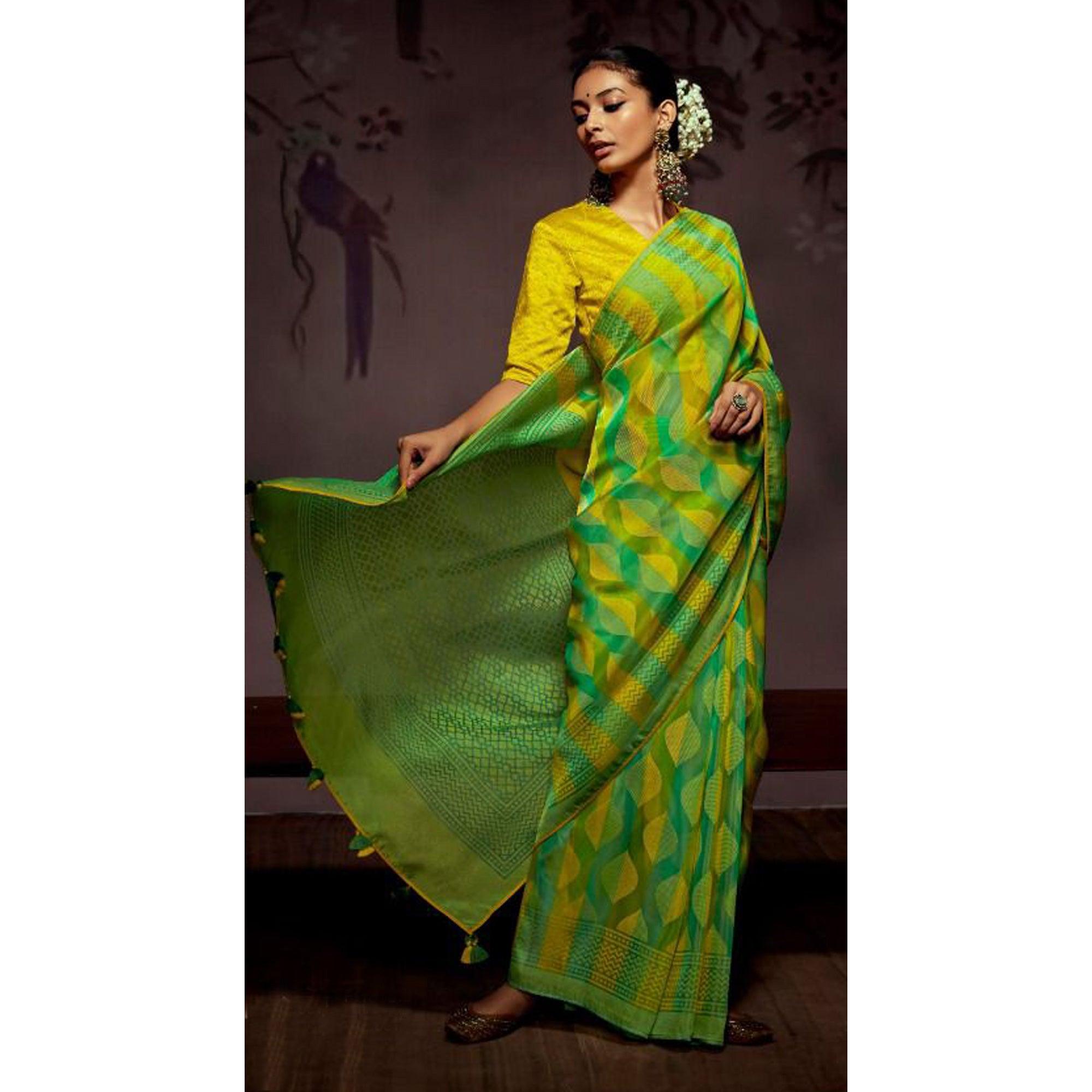 Green Woven Brasso Saree With Tassels - Peachmode
