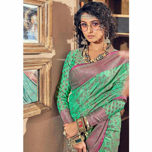 Green Woven Pure Silk Saree With Tassels - Peachmode