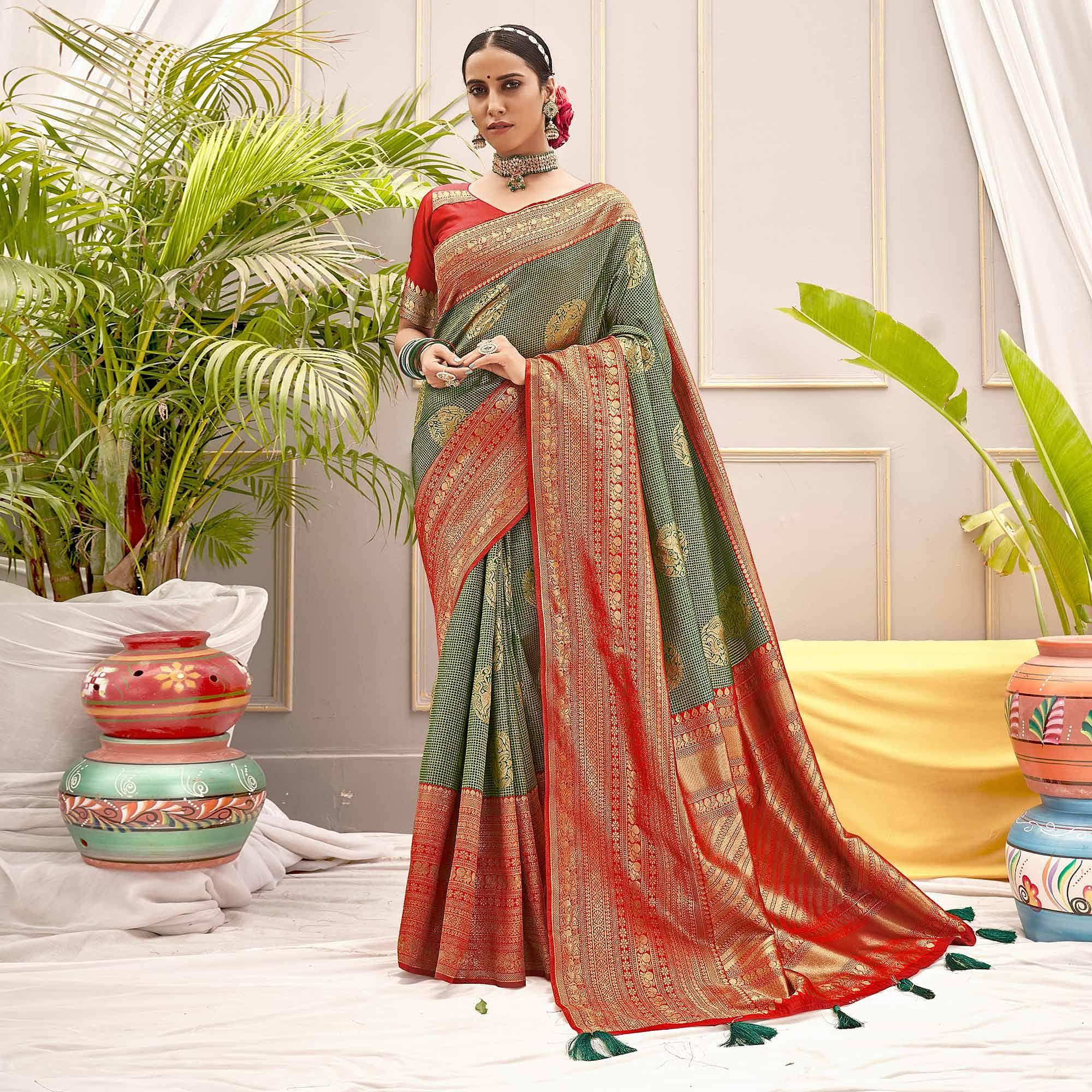 Green Woven Pure Silk Saree With Tassels - Peachmode