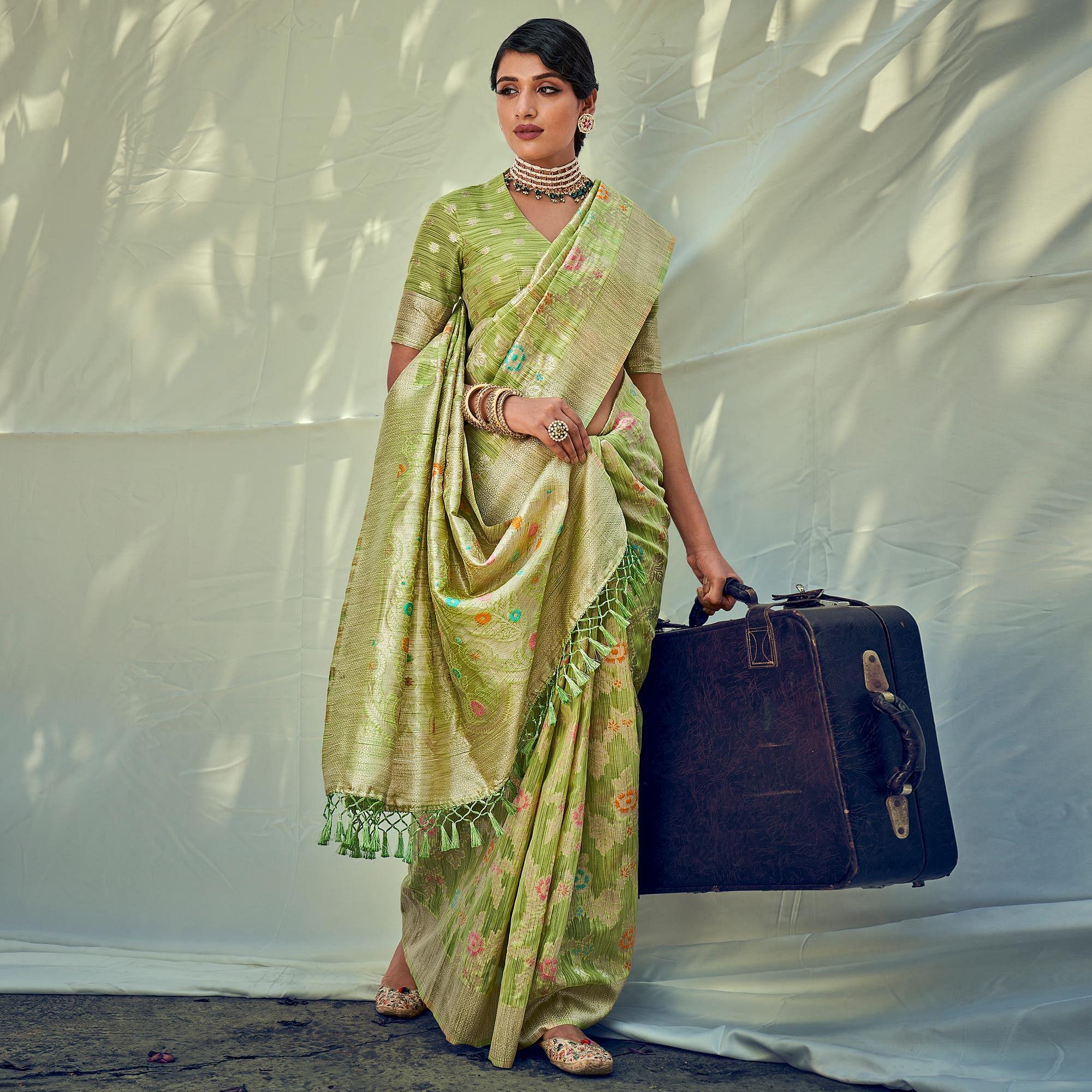 Green Woven Pure Silk Saree With Tassels - Peachmode