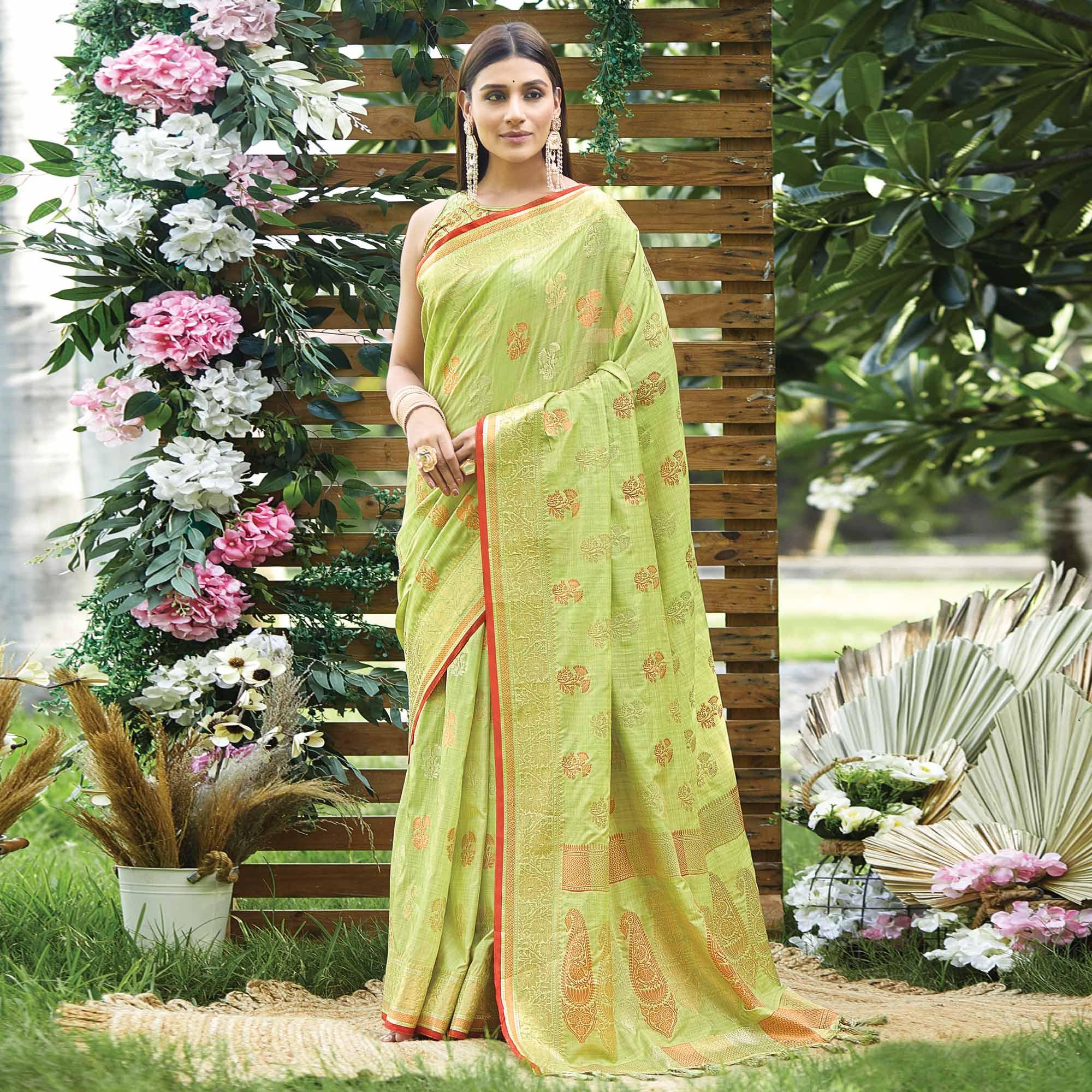 Green Woven Raw Silk Saree With Tassels - Peachmode