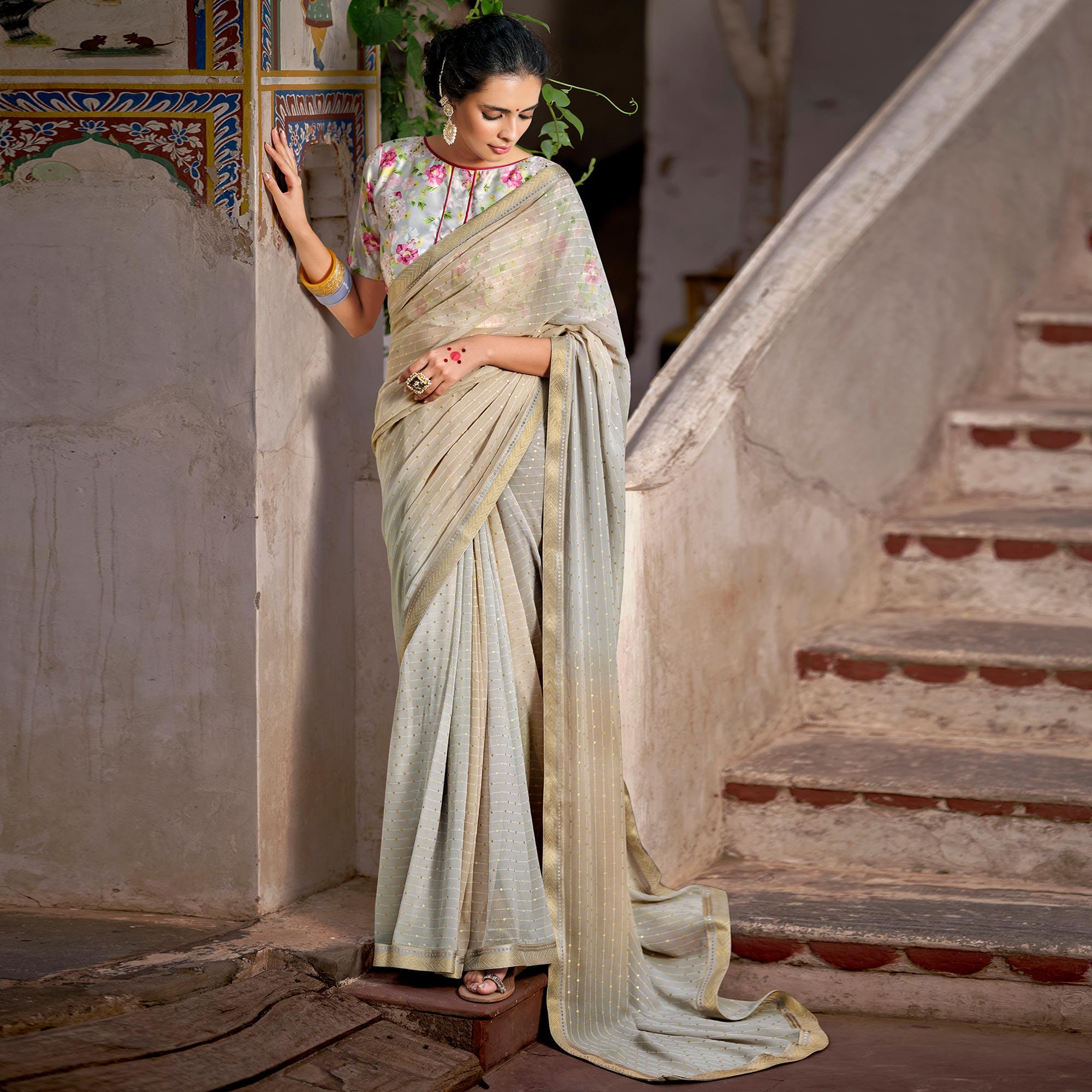 Grey Casual Wear Foil Printed Georgette Saree - Peachmode