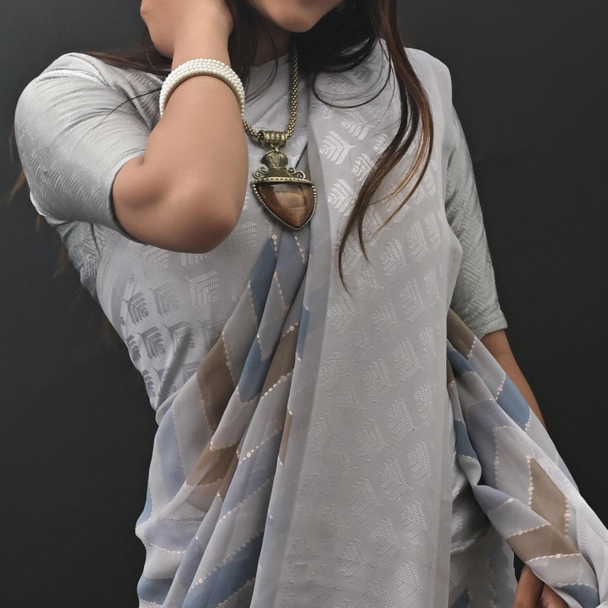 Grey Printed Jacquard Border Georgette Saree - Peachmode