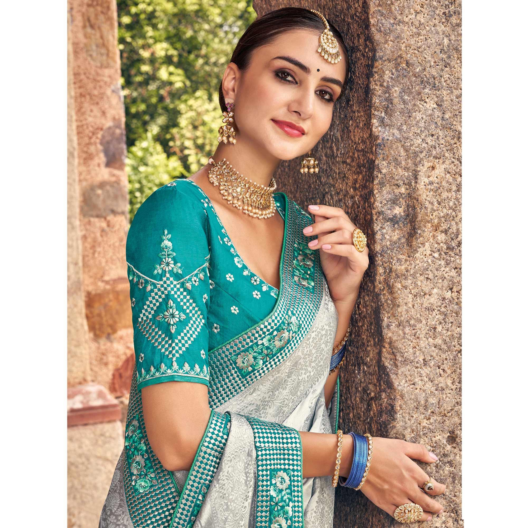 Grey Woven Banarasi Silk Saree With Tassels - Peachmode