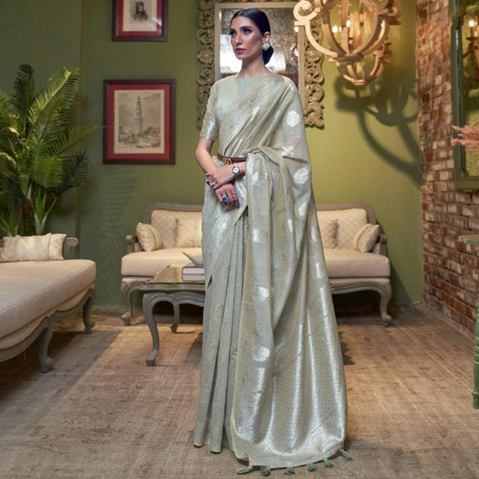 Grey Woven Linen Saree With Tassels - Peachmode