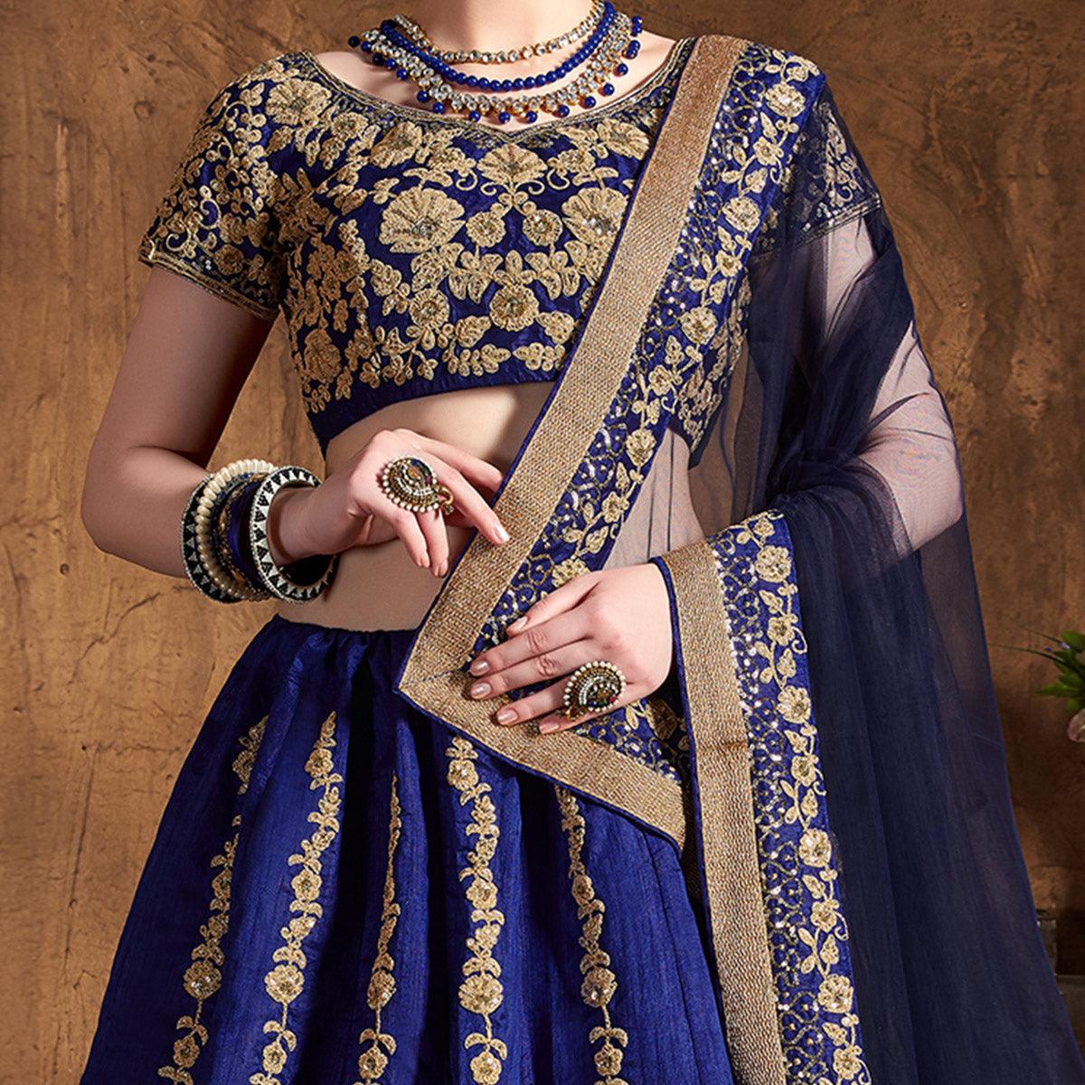 Hypnotic Blue Colored Designer Partywear Raw Silk Lehenga Choli - Peachmode