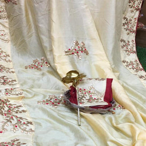 Hypnotic Cream Colored Festive Wear Butta Work Dola Silk Saree - Peachmode