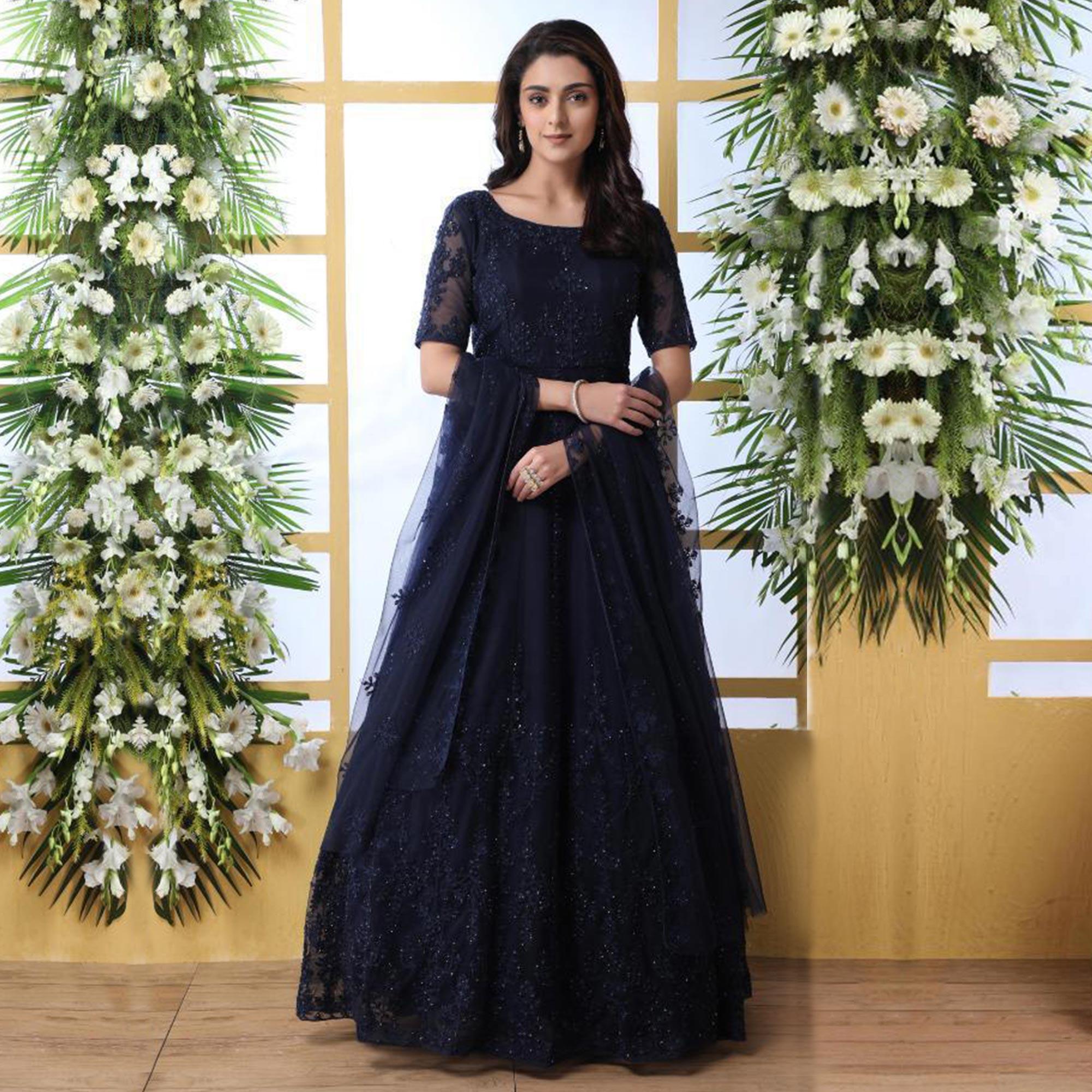 Hypnotic Navy Blue Colored Party Wear Embroidered Net Gown With Dupatta - Peachmode