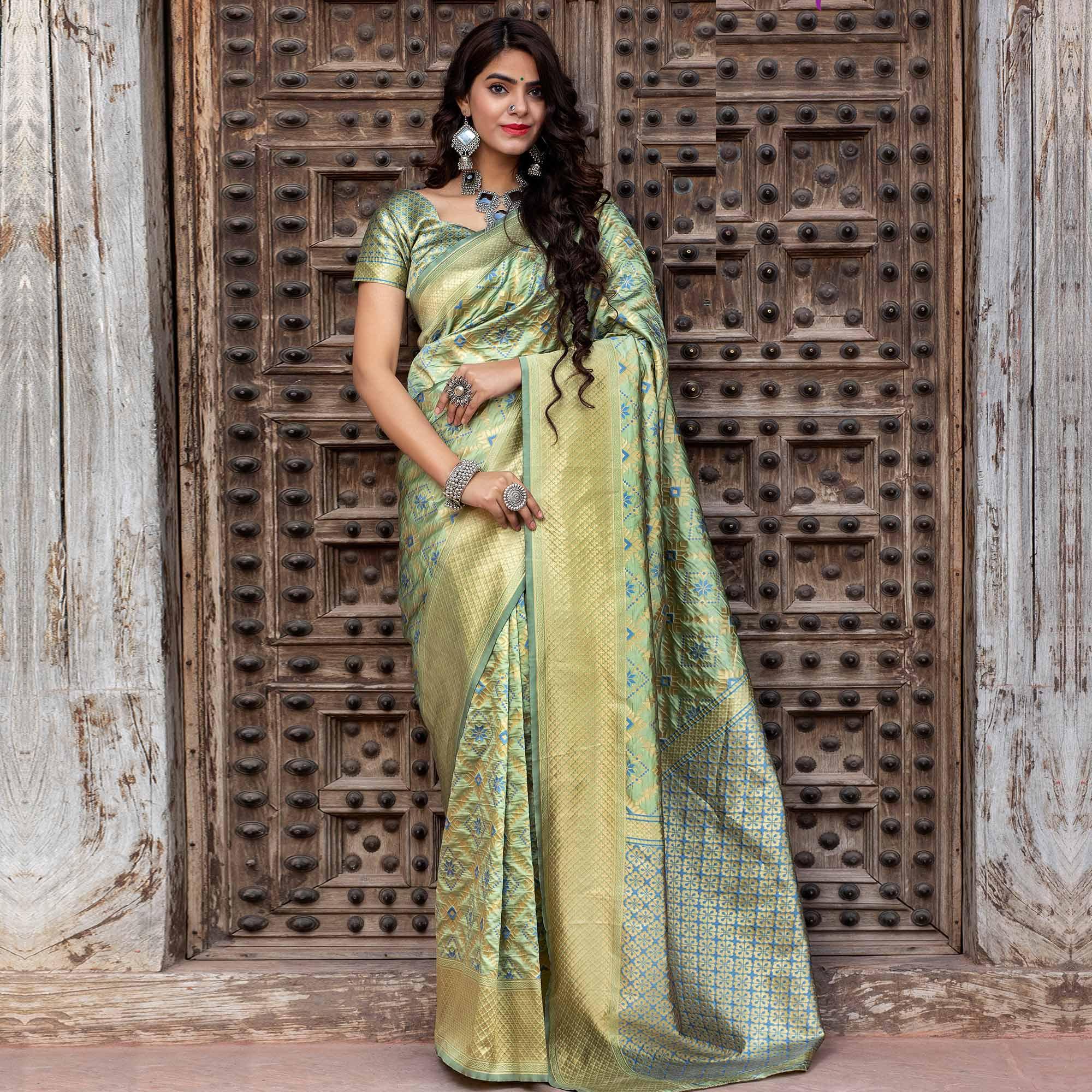 Hypnotic Pista Green Colored Festive Wear Woven Banarasi Silk Saree - Peachmode