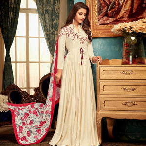 Imposing Cream Colored Partywear Embroidered Heavy Muslin Gown - Peachmode