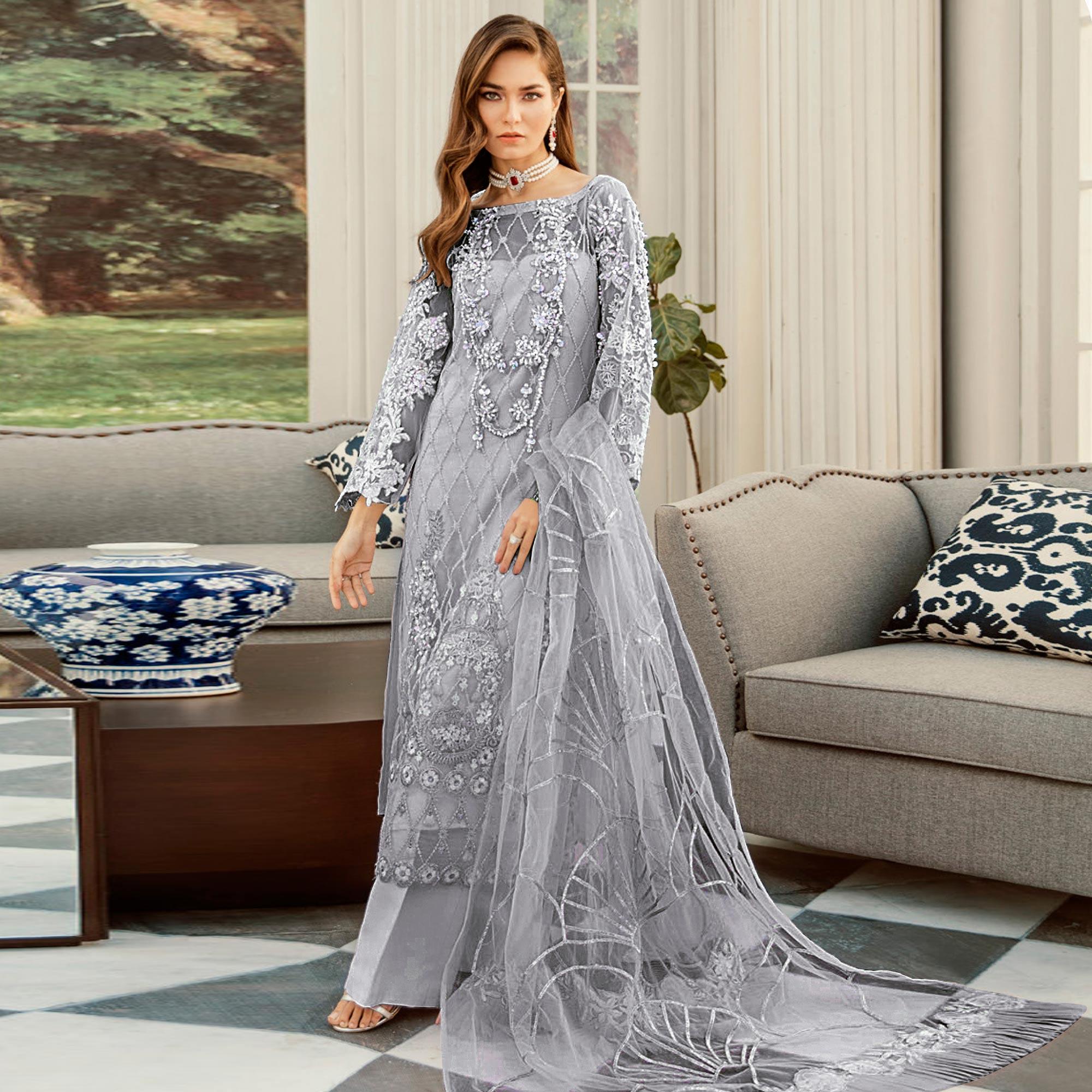 Imposing Grey Cololred Partywear Embroidered Net Palazzo Suit - Peachmode