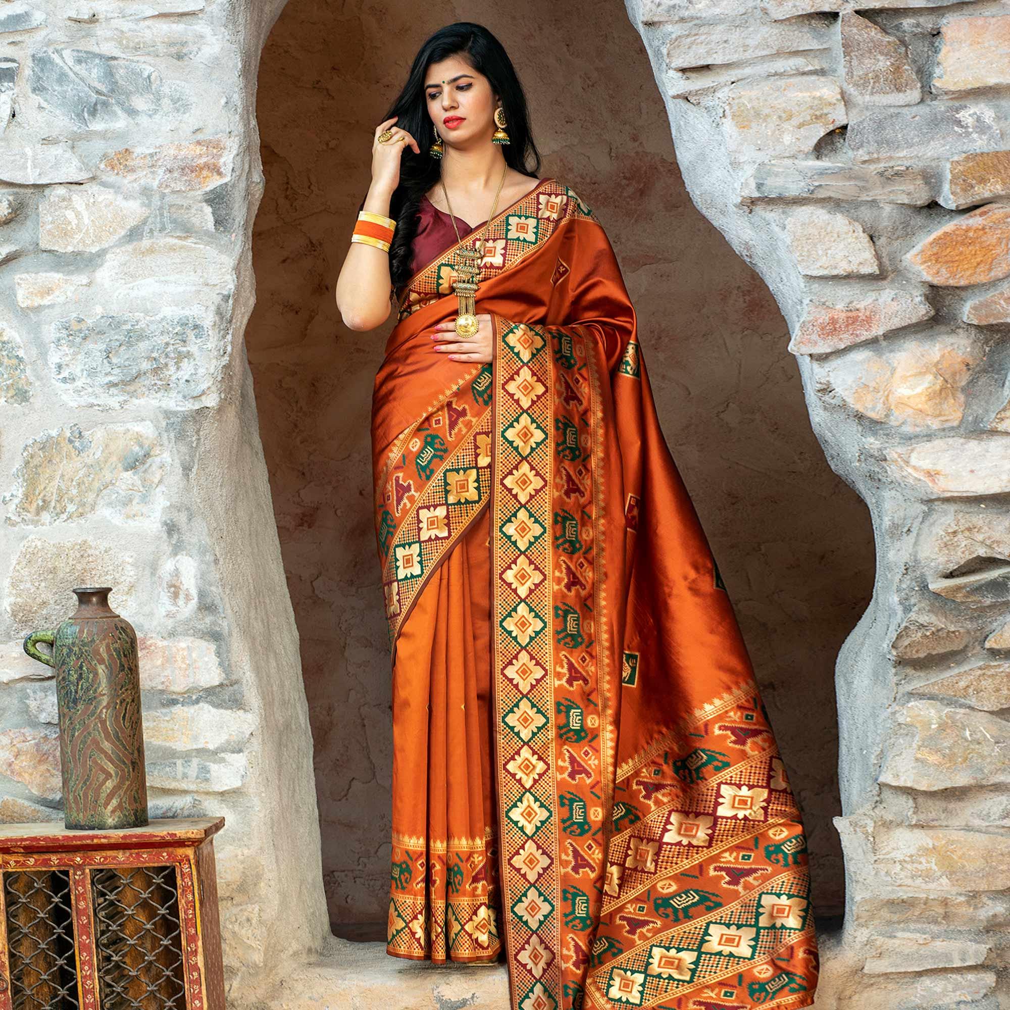 Imposing Orange Colored Festive Wear Woven Patola Silk Saree - Peachmode