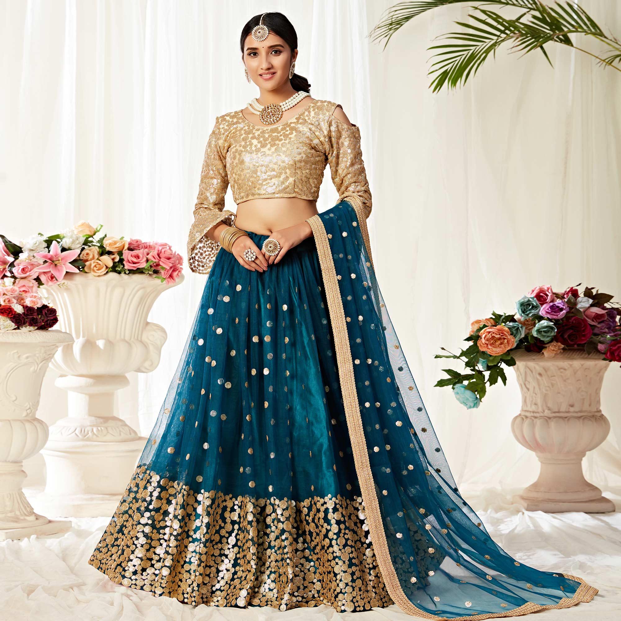 Imposing Peacock Blue Colored Wedding Wear Embroidered Heavy Net Lehenga Choli - Peachmode