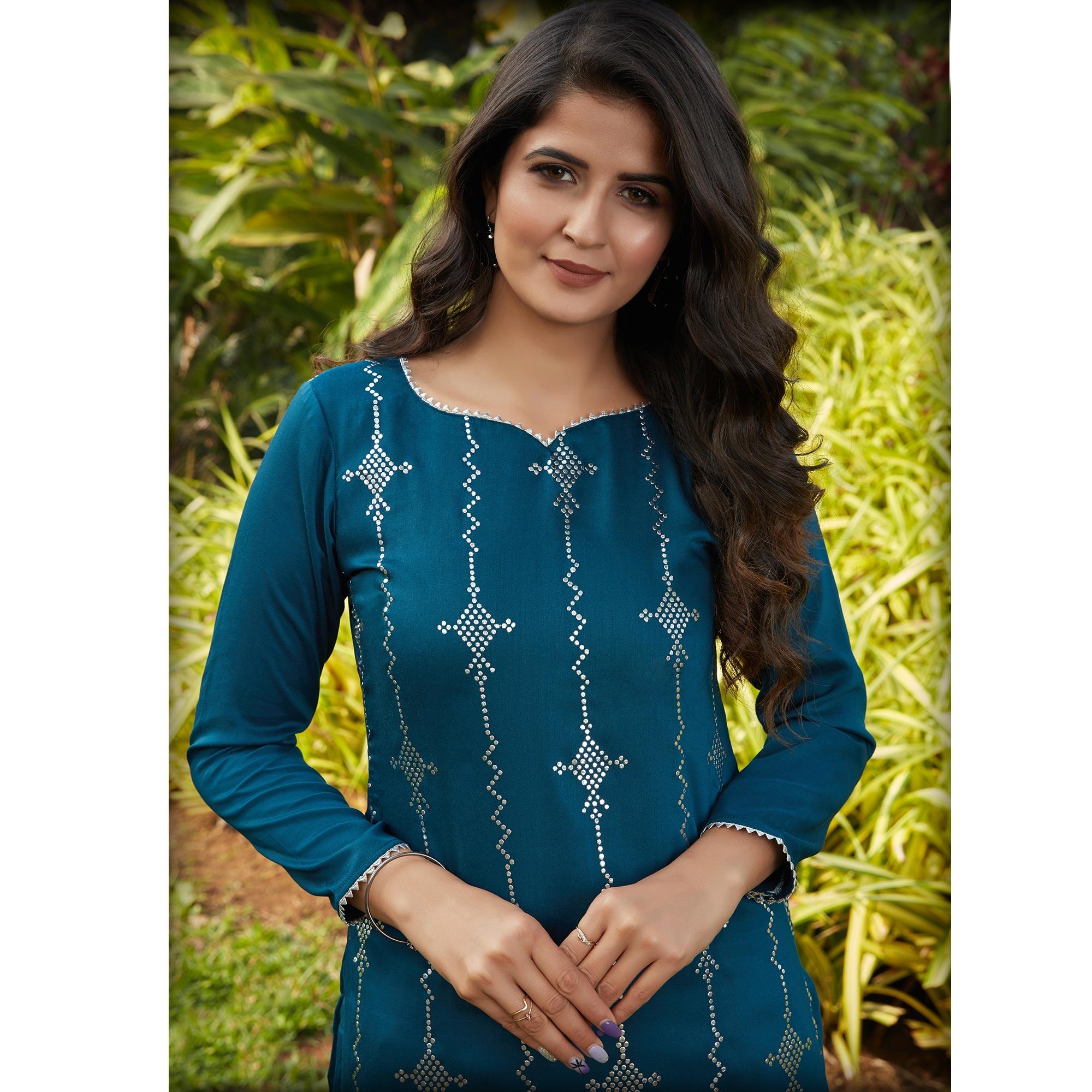 Imposing Rama Green Casual Wear Glistering Embellishment Silky Cotton Kurti - Peachmode