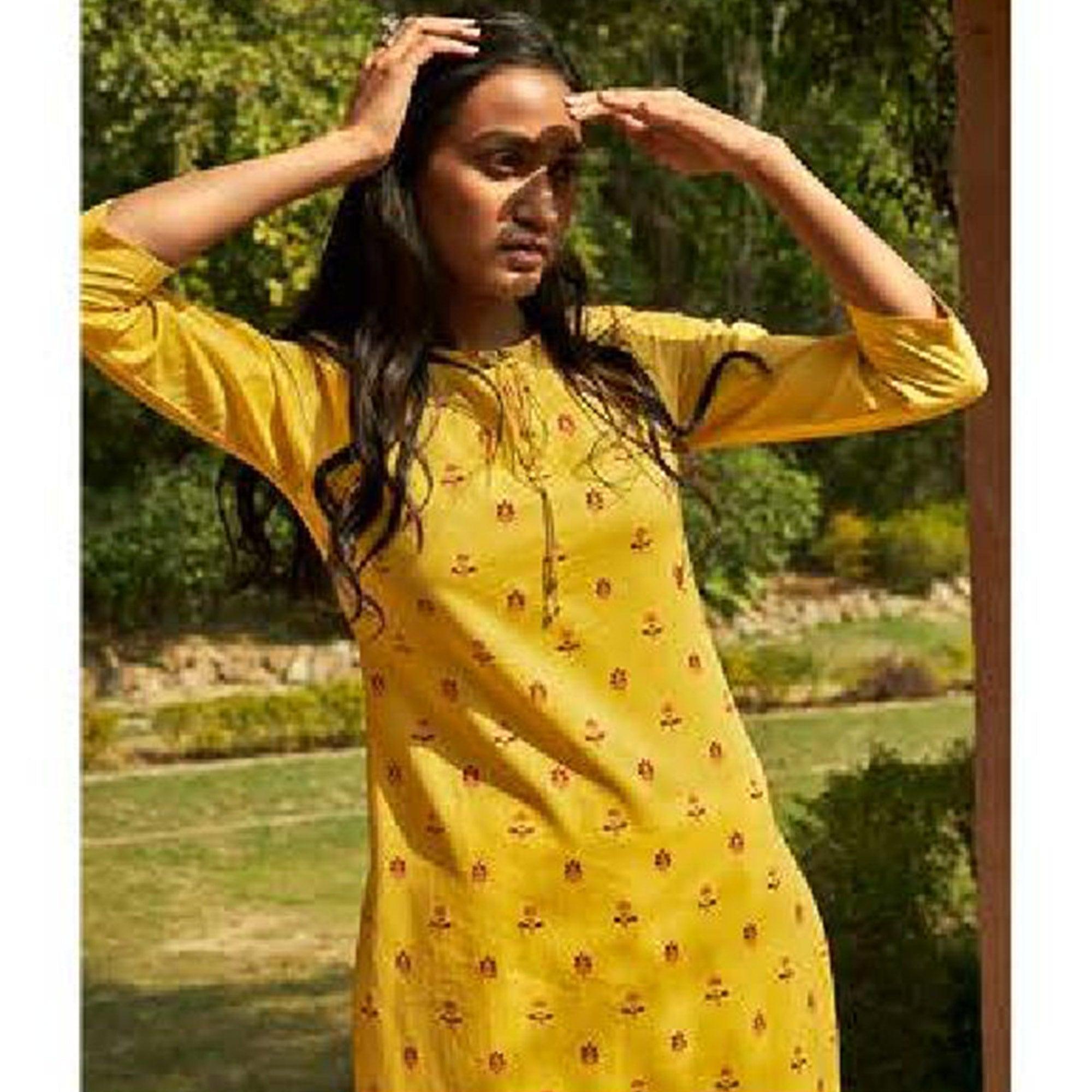 Imposing Yellow Colored Casual Wear Embroidered Cotton Kurti With Bottom - Peachmode