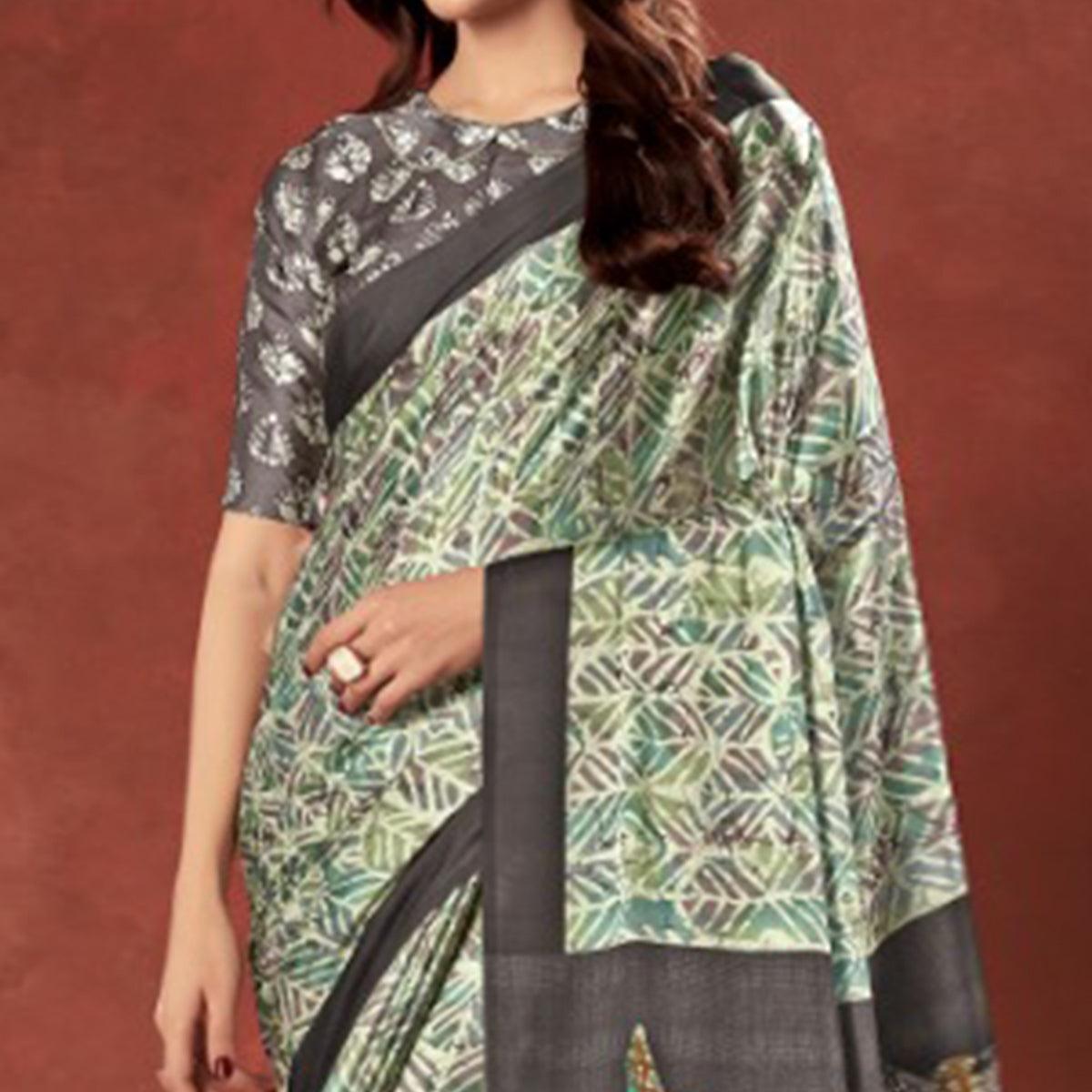 Impressive Green Colored Casual Wear Printed Satin Crepe Saree With Tassels - Peachmode