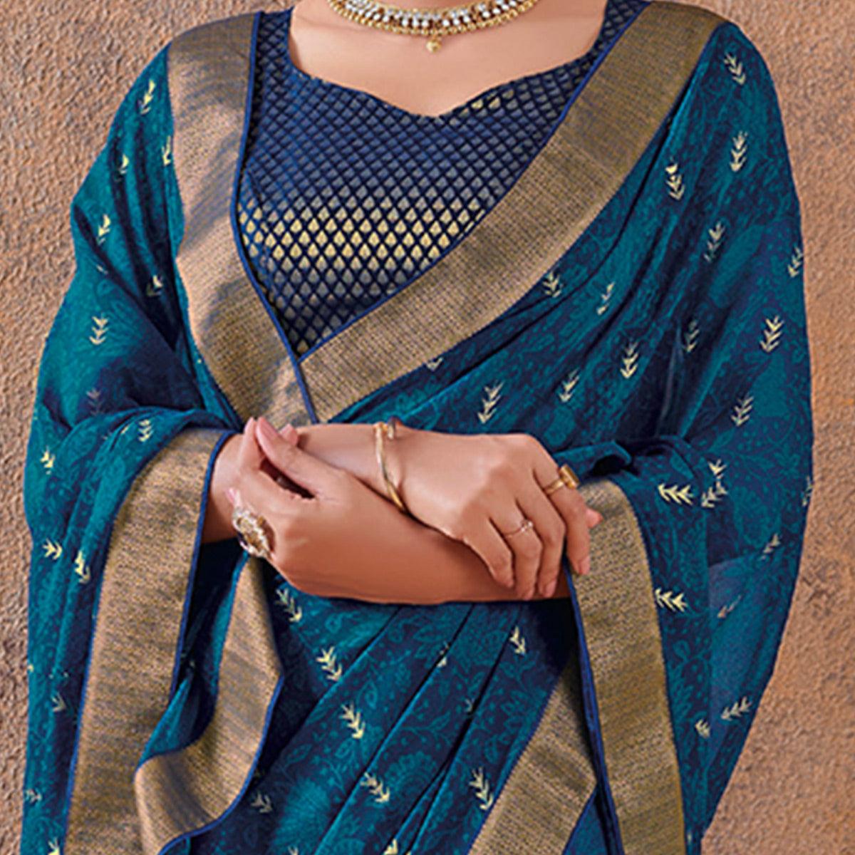 Innovative Blue Colored Festive Wear Foil Printed Georgette Saree - Peachmode