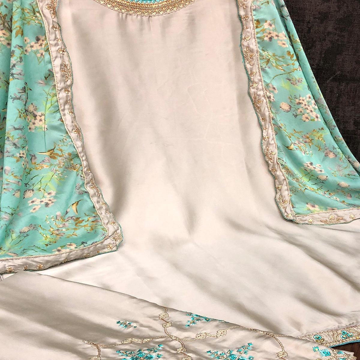 Innovative Grey Colored Partywear Embroidered Muslin Satin Gharara Suit With Palazzo - Peachmode