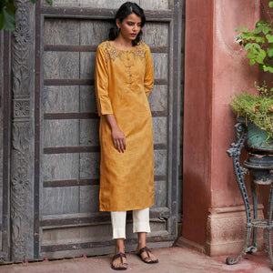 Innovative Mustard Yellow Colored Casual Wear Embroidered Pure Cotton Kurti - Peachmode