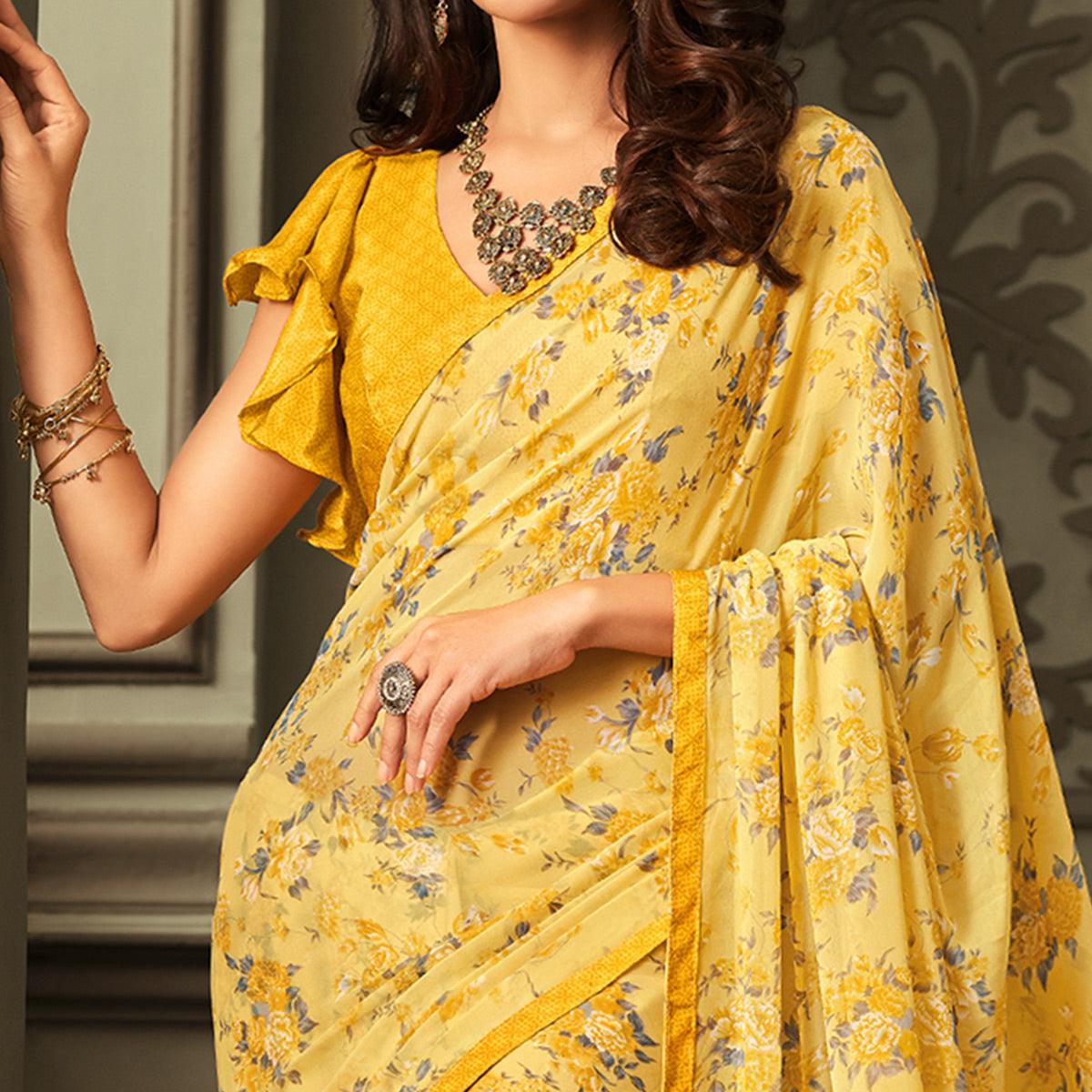 Innovative Yellow Colored Casual Floral Printed Georgette Saree - Peachmode