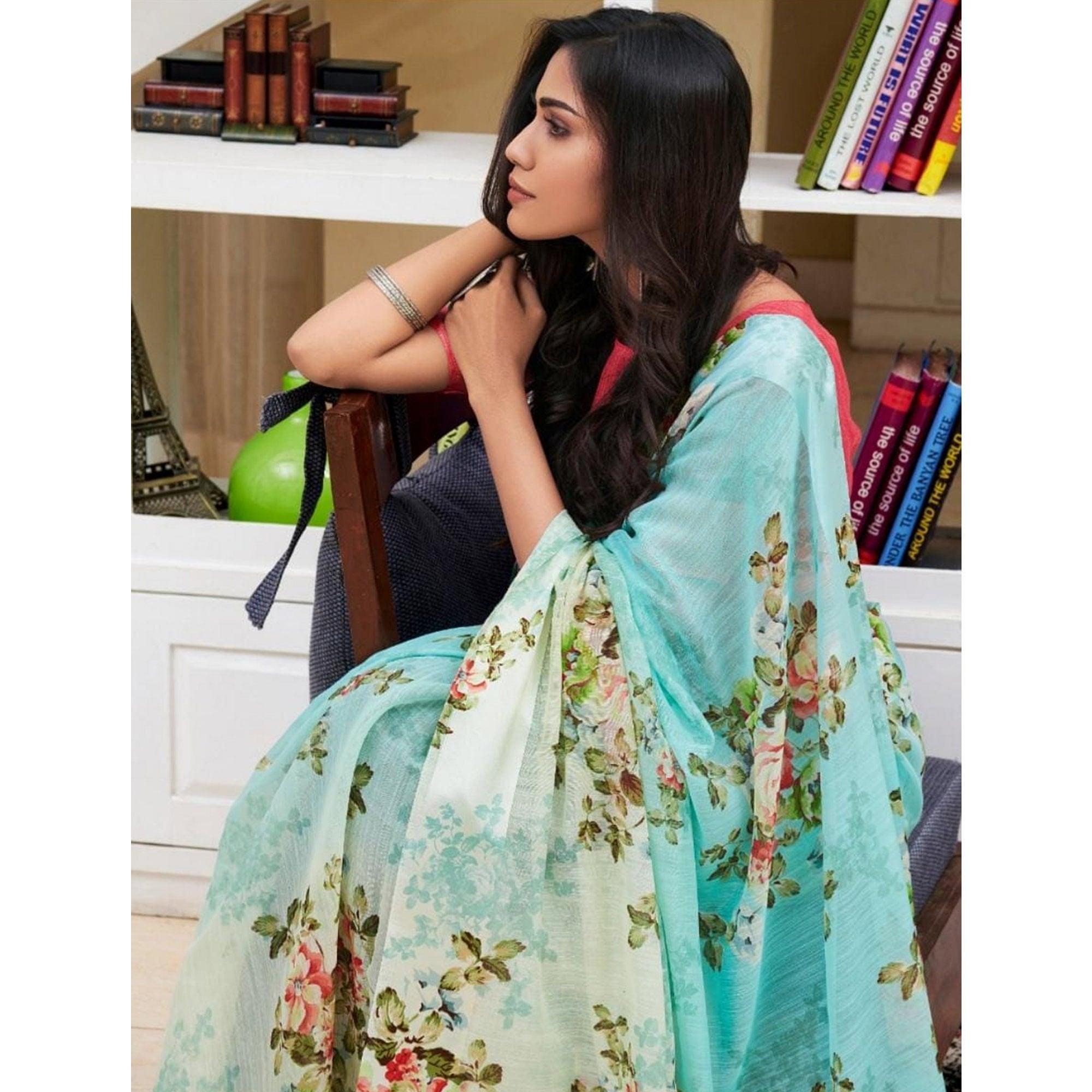 Intricate Aqua Blue Colored Casual Wear Floral Printed Linen Saree - Peachmode