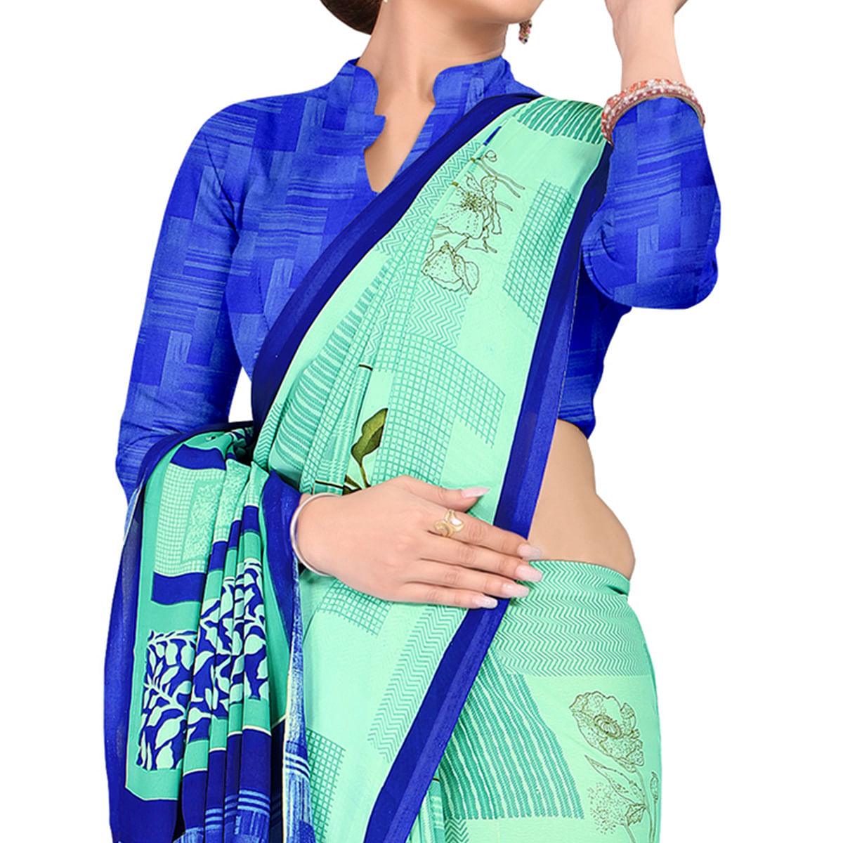 Intricate Aqua Green Colored Casual Wear Printed Georgette Saree - Peachmode