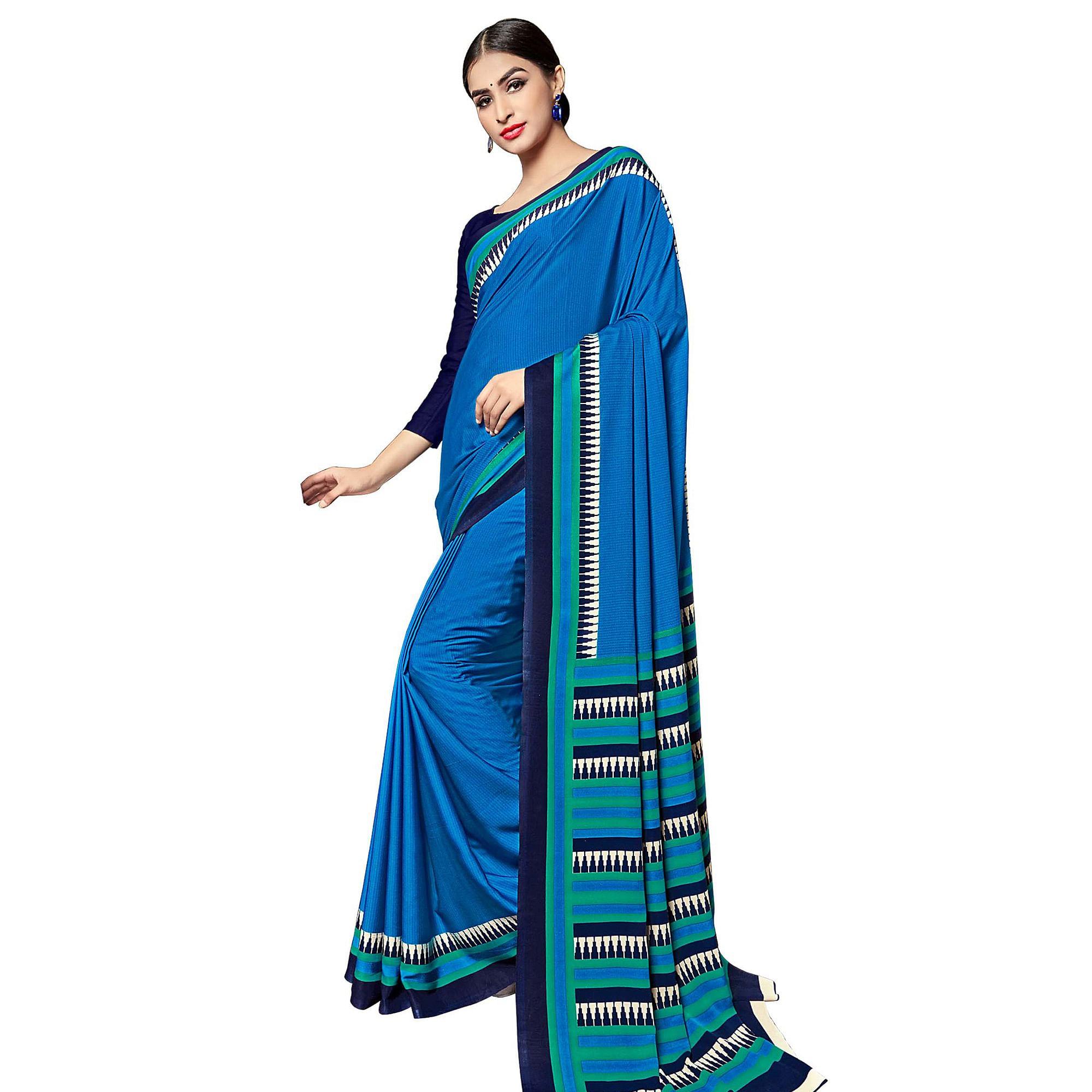 Intricate Blue Colored Casual Wear Printed Crepe Saree - Peachmode