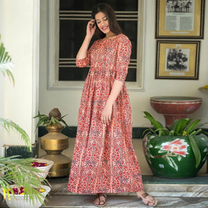 Intricate Peach Colored Casual Printed Muslin Blend Gown - Peachmode
