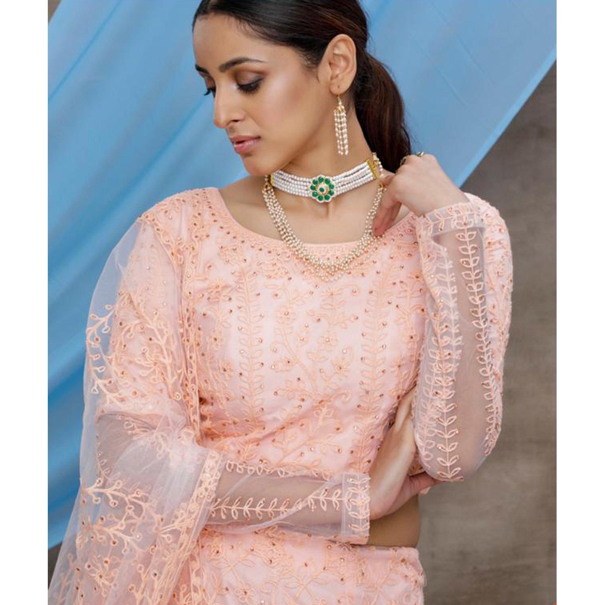 Intricate Peach Colored Party Wear Embroidered Net Lehenga Choli - Peachmode