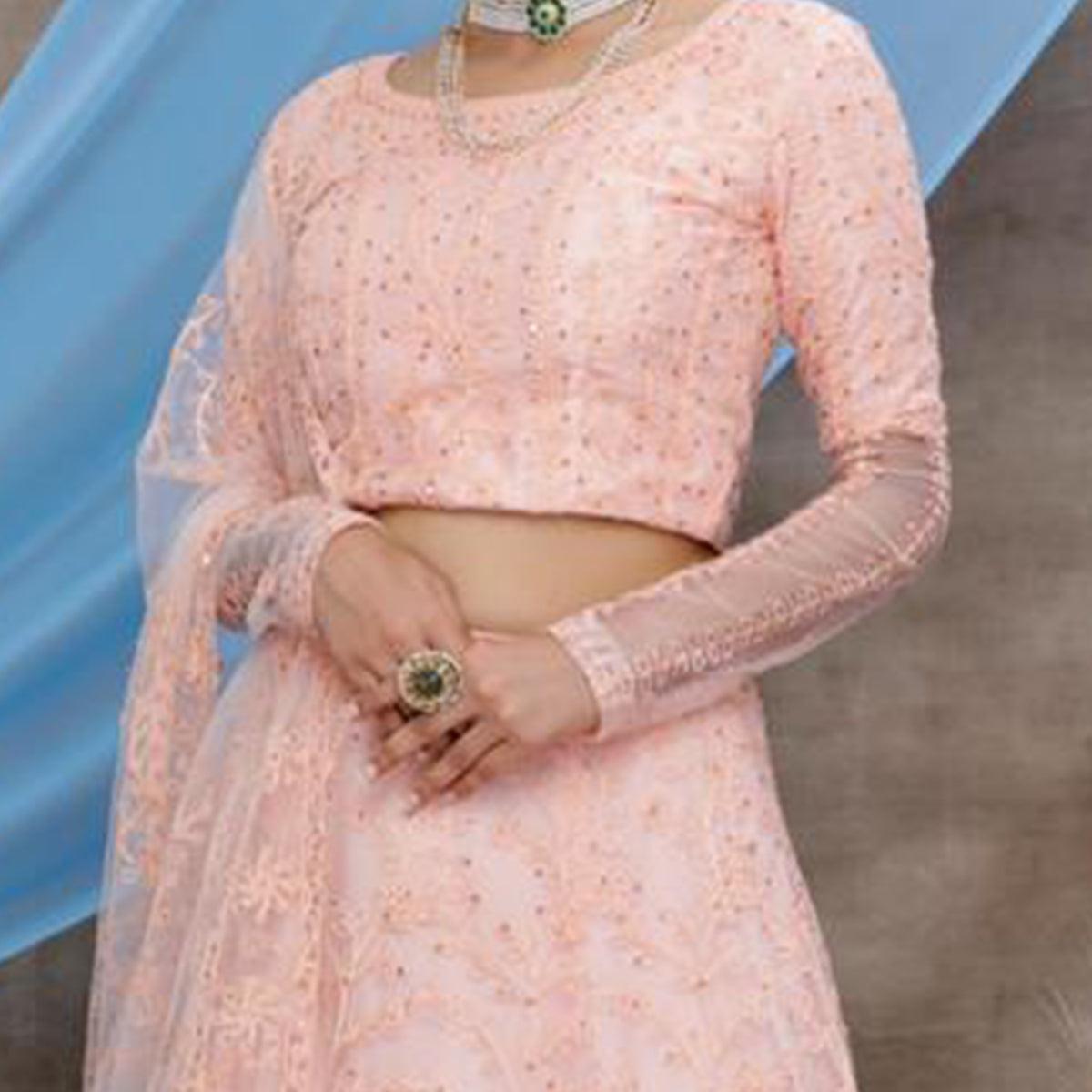 Intricate Peach Colored Party Wear Embroidered Net Lehenga Choli - Peachmode