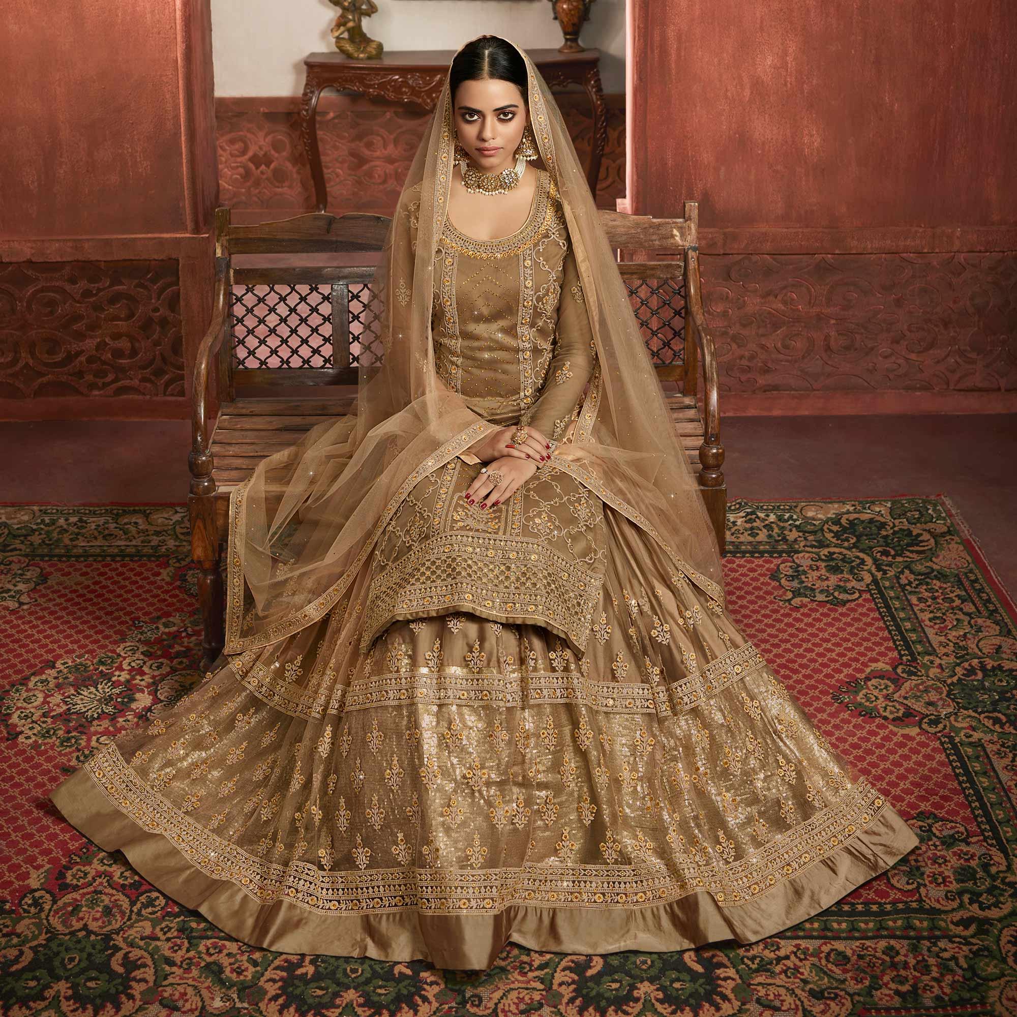 Jazzy Beige Coloured Partywear Embroidered Super Net Sharara Style Salwar Suit - Peachmode