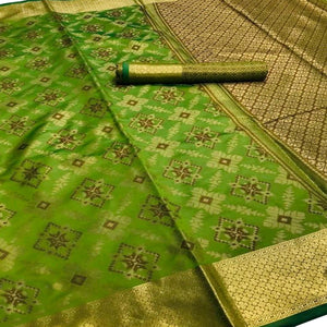 Jazzy Olive Green Colored Festive Wear Woven Silk Saree - Peachmode