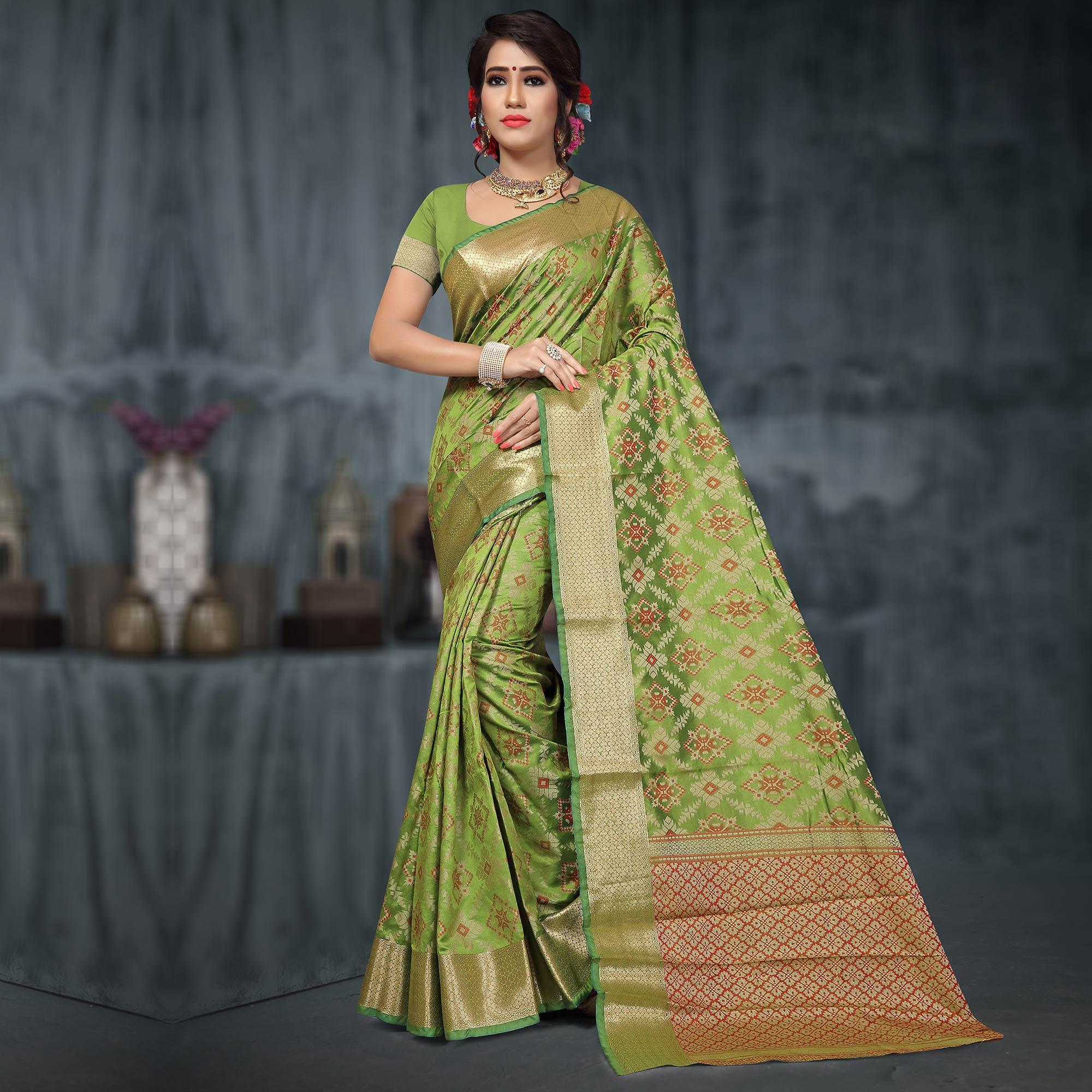 Jazzy Olive Green Colored Festive Wear Woven Silk Saree - Peachmode