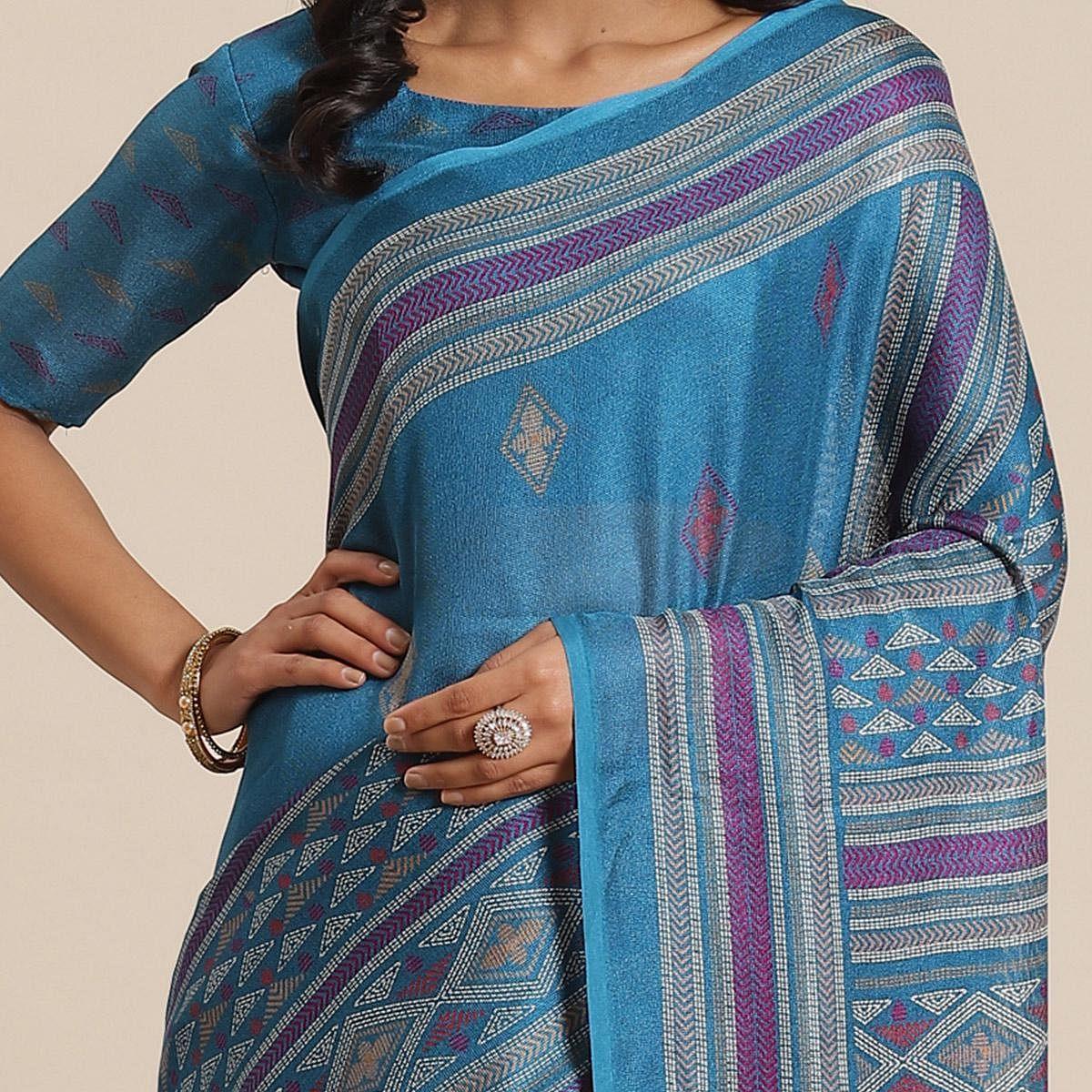 Jazzy Teal Blue Colored Casual Wear Printed Jute Silk Saree - Peachmode